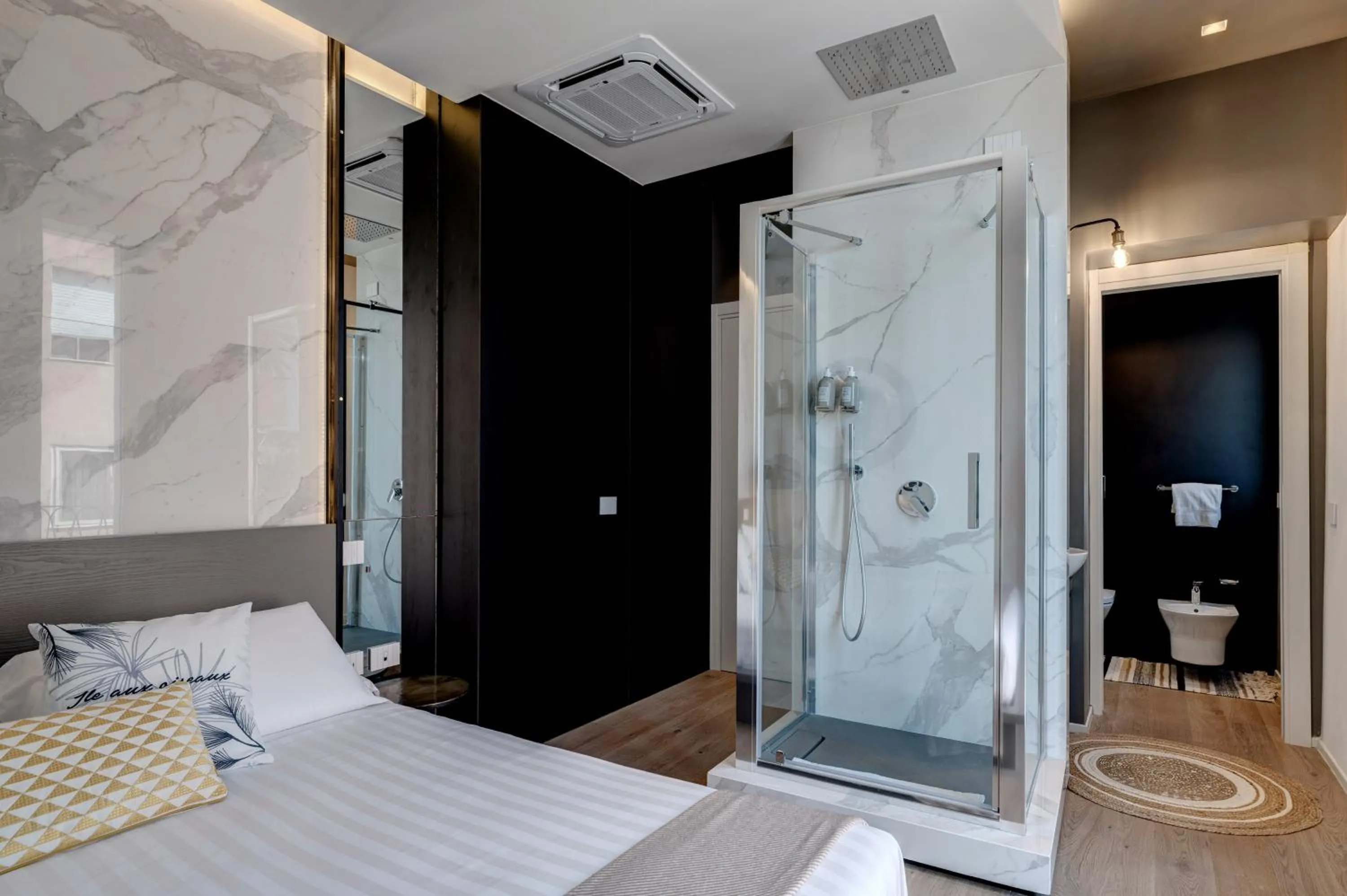 Bed in Le Palmette Suites