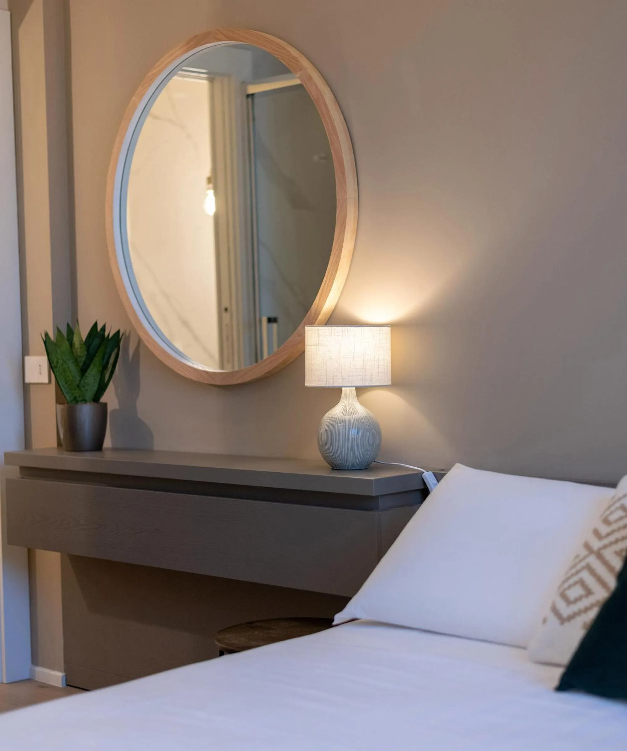 Decorative detail, Bed in Le Palmette Suites