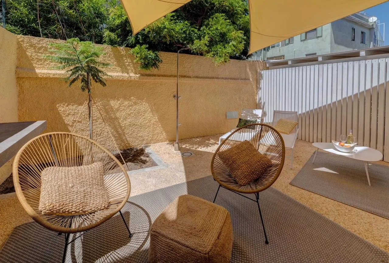 Inner courtyard view in Le Palmette Suites