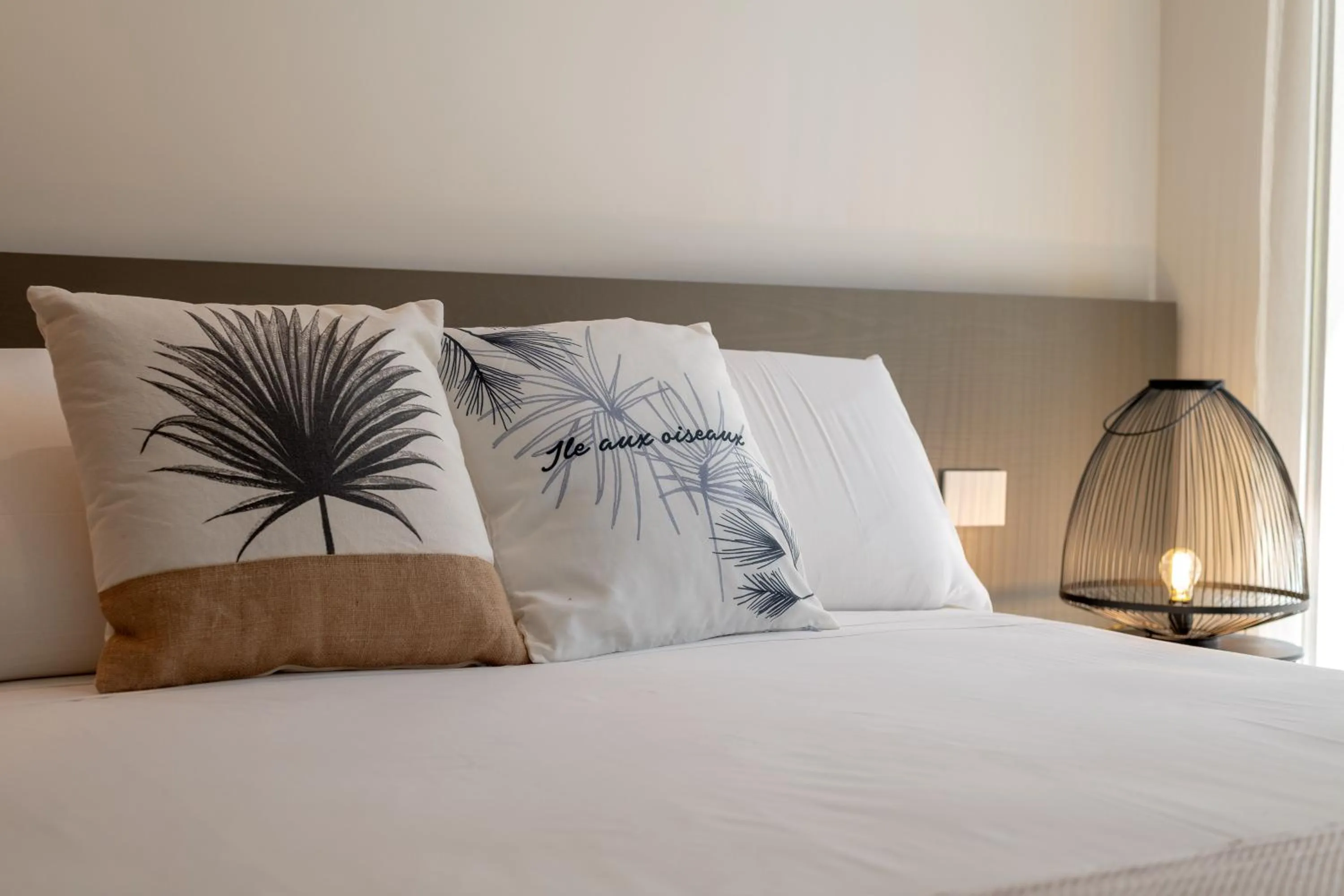 Bed in Le Palmette Suites