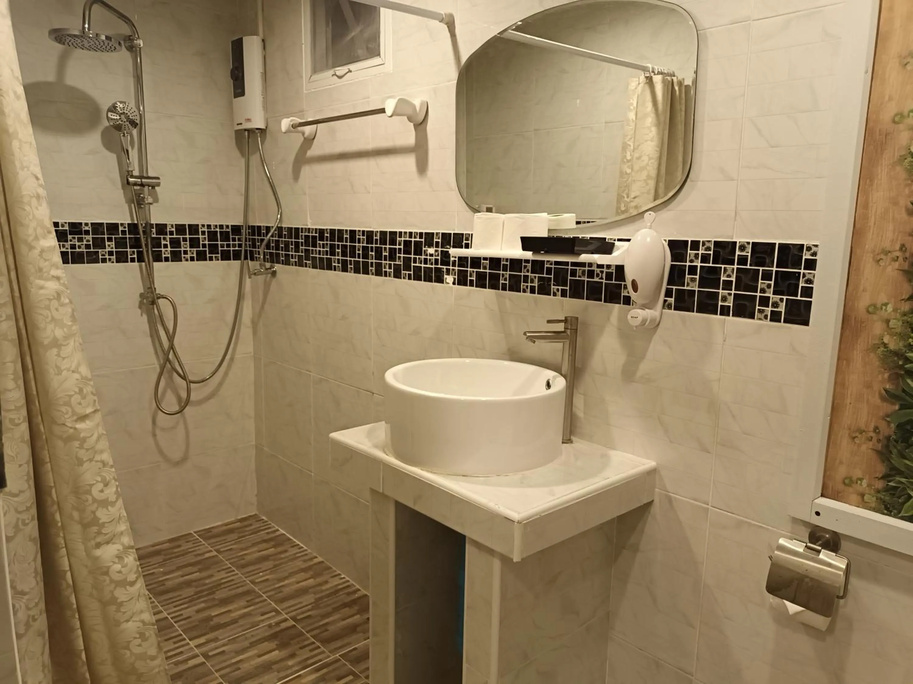 Shower in Cana Boutique Hotel