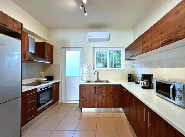 Kitchen or kitchenette in Azure Beach Villas