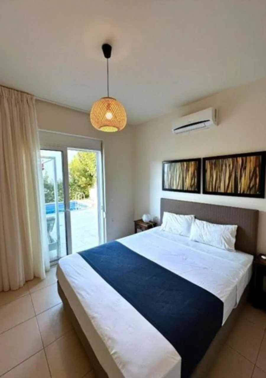 Bed in Azure Beach Villas