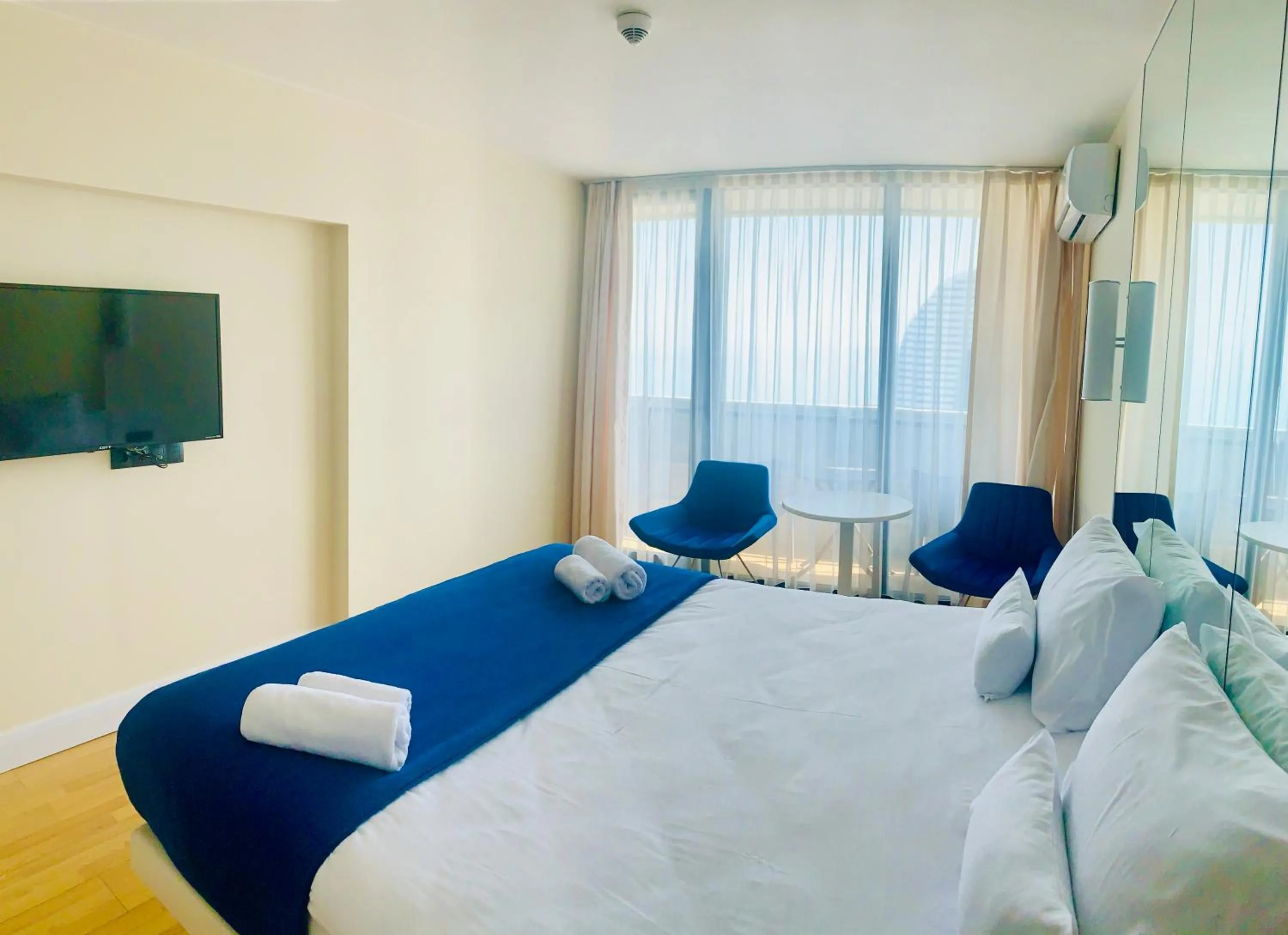 Photo of the whole room, Bed in Royal Sea Breeze Apartments