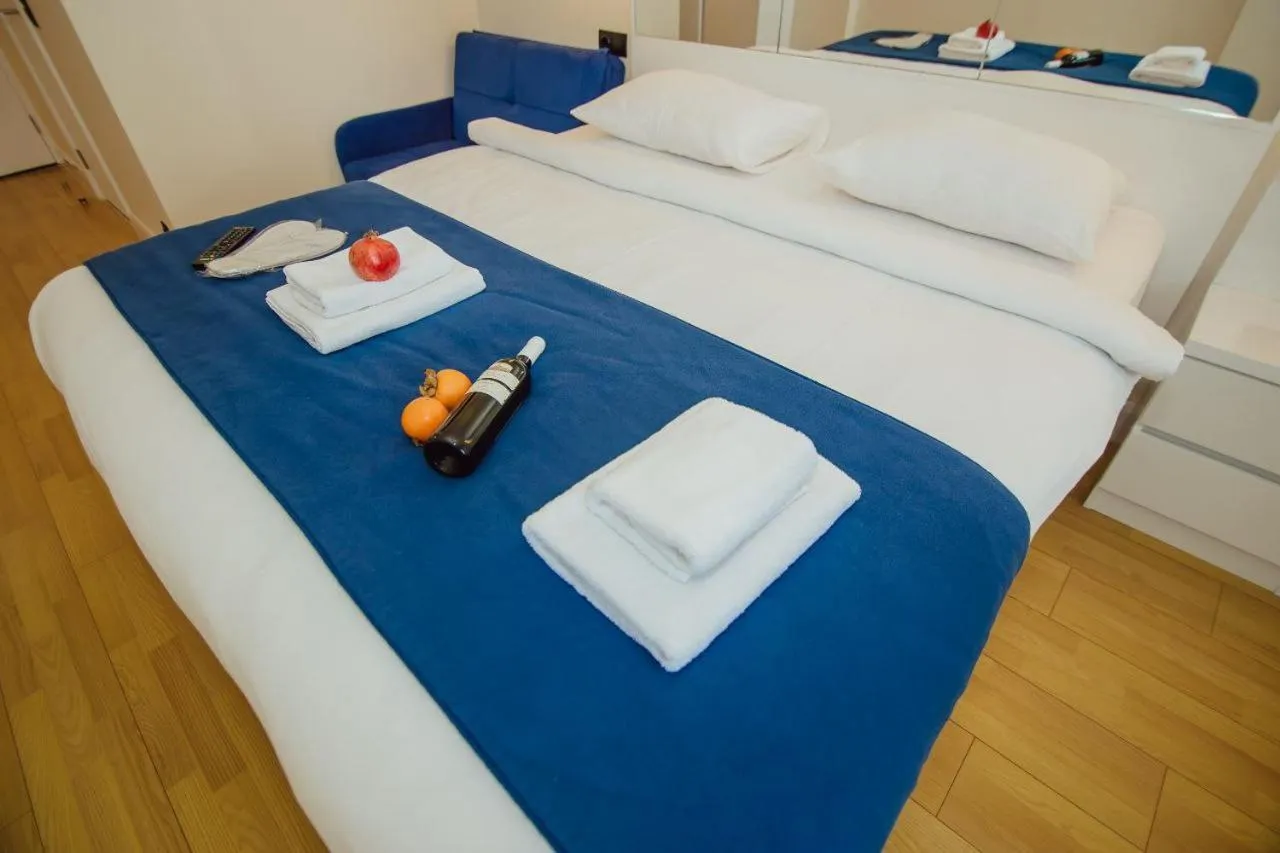 Bed in Royal Sea Breeze Apartments