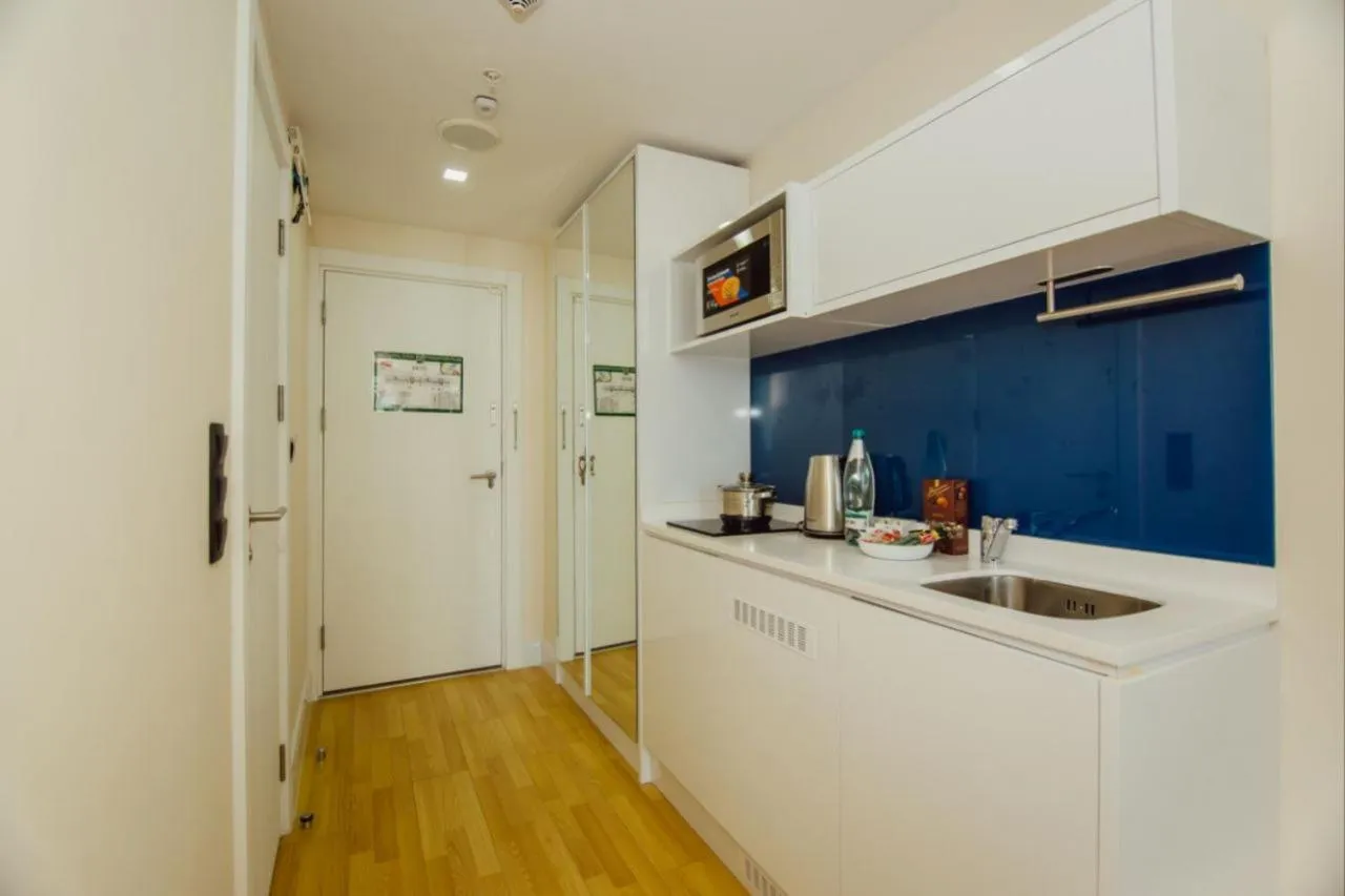 Kitchen or kitchenette in Royal Sea Breeze Apartments
