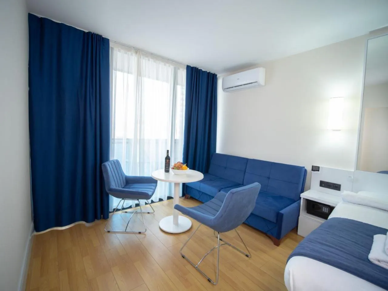 Seating area, Bed in Royal Sea Breeze Apartments