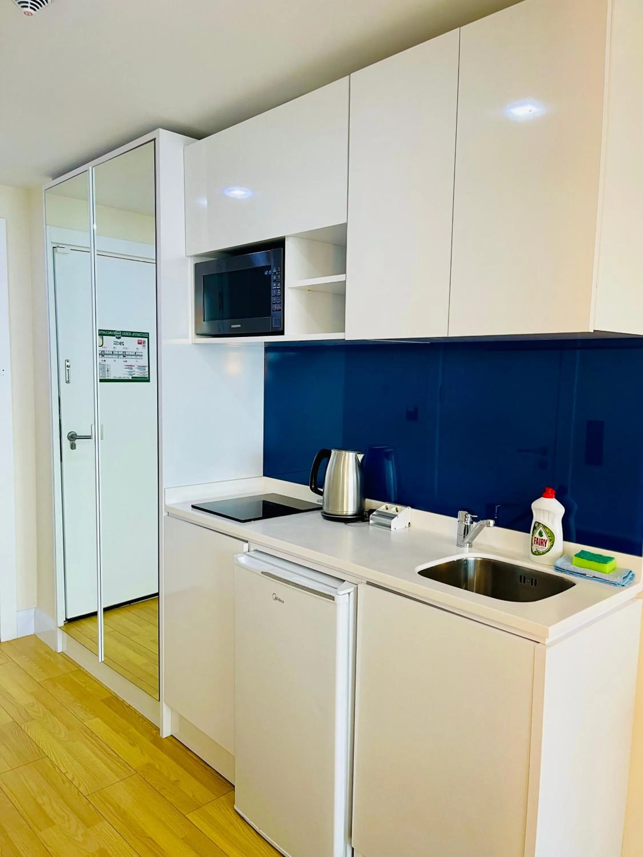 Kitchen or kitchenette in Royal Sea Breeze Apartments