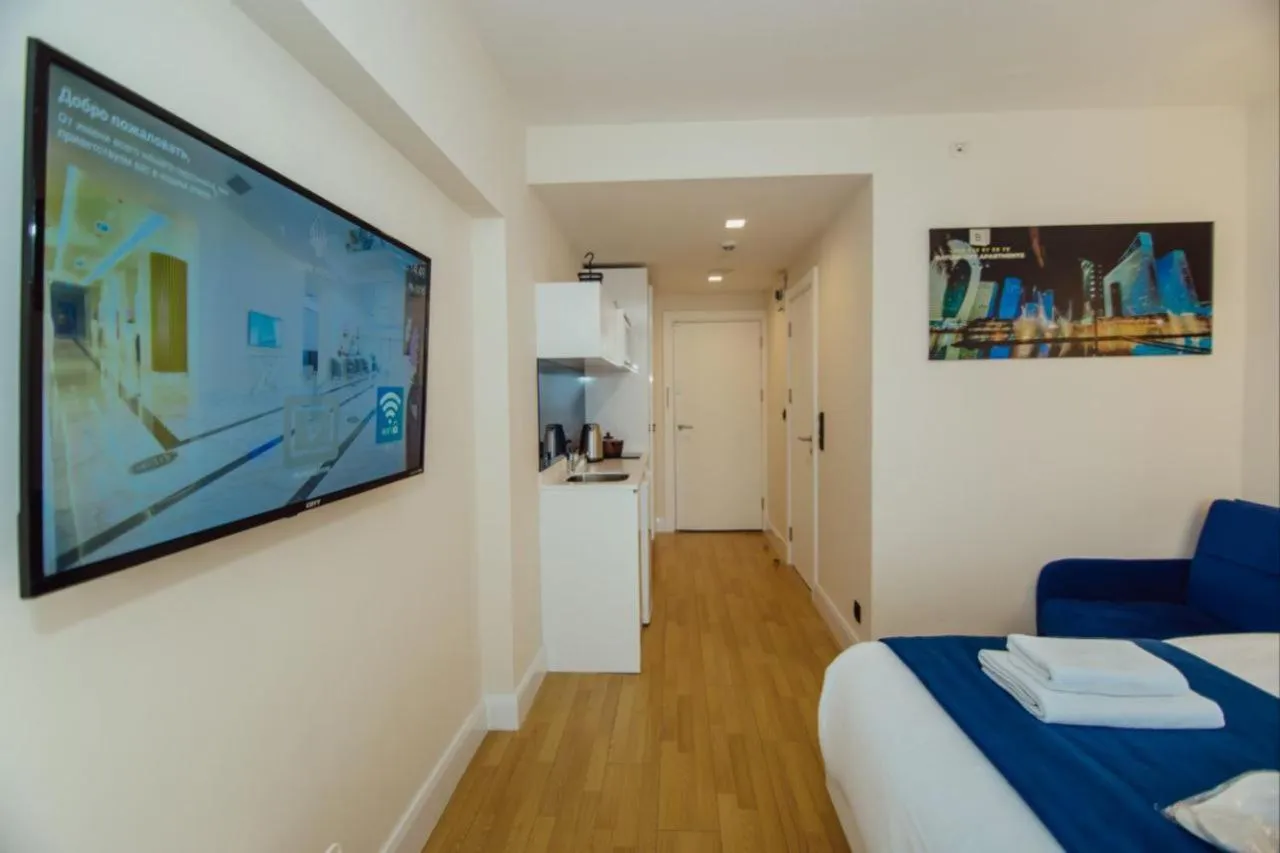 Kitchen or kitchenette, Bed in Royal Sea Breeze Apartments