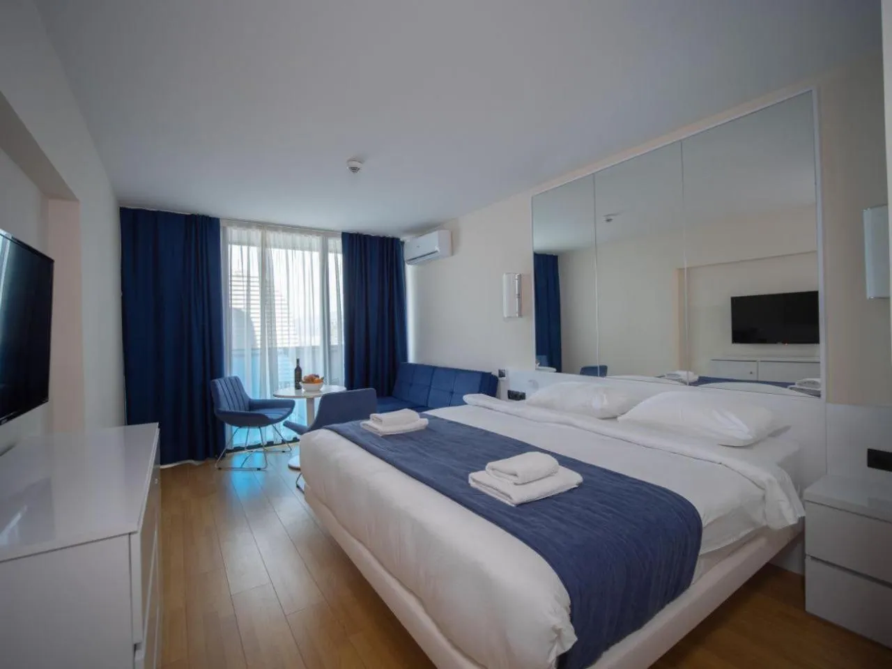 Bed in Royal Sea Breeze Apartments
