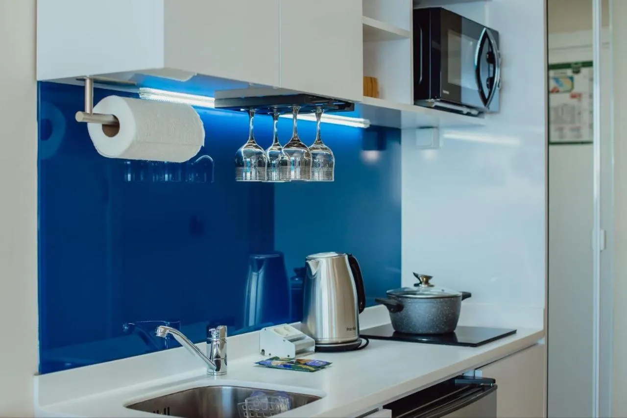 Kitchen or kitchenette in Royal Sea Breeze Apartments