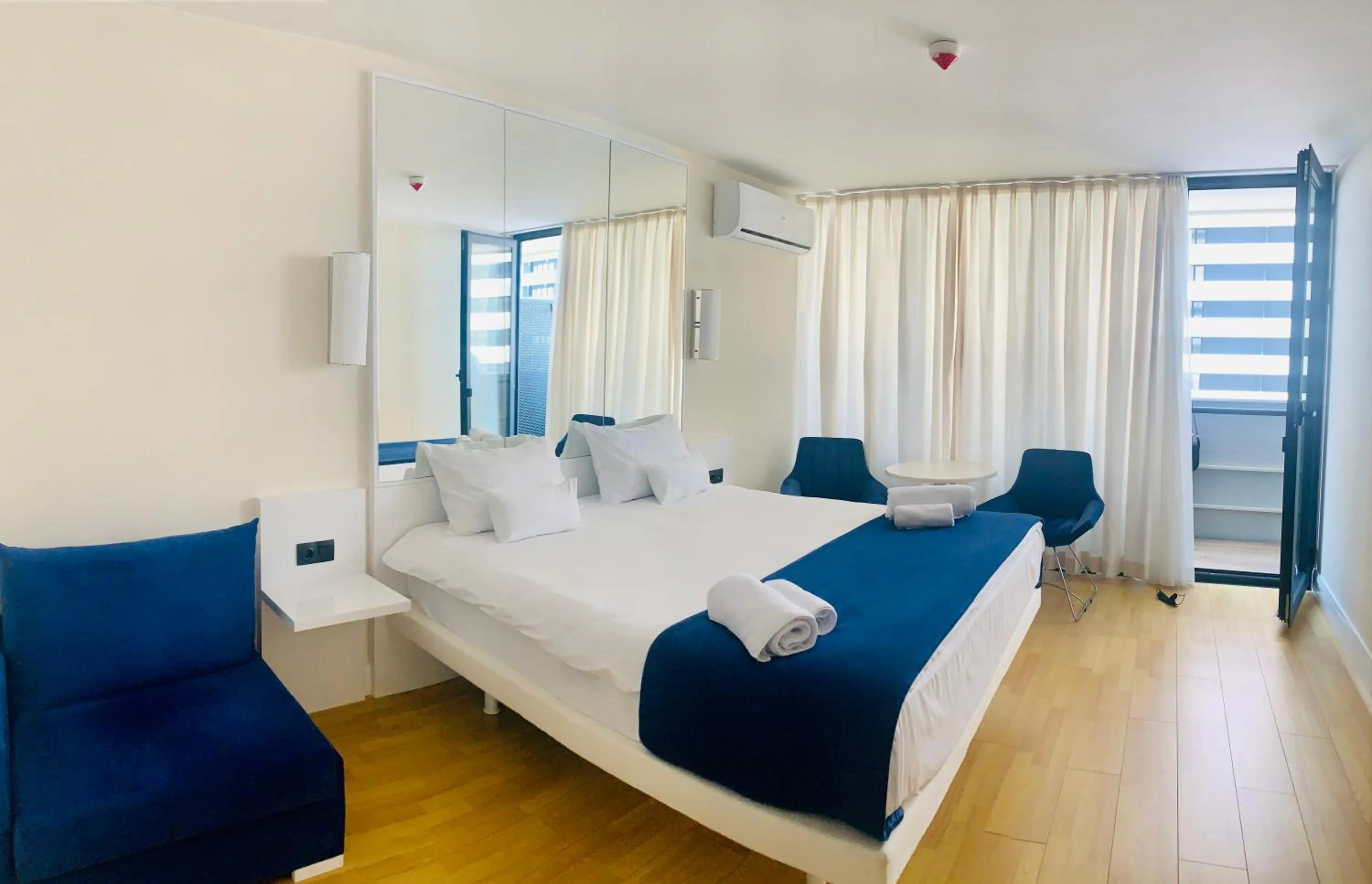 Bed in Royal Sea Breeze Apartments