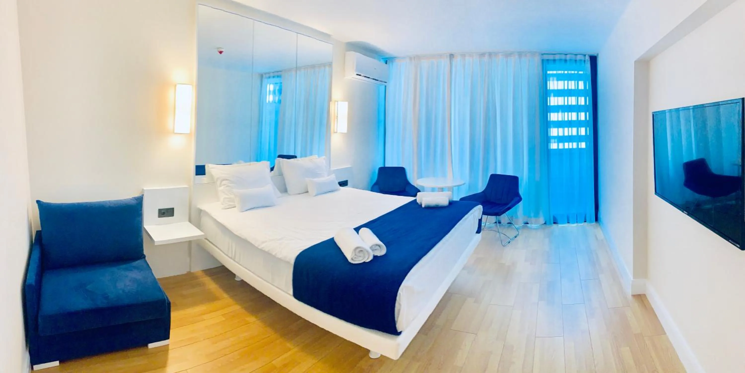 Bed in Royal Sea Breeze Apartments