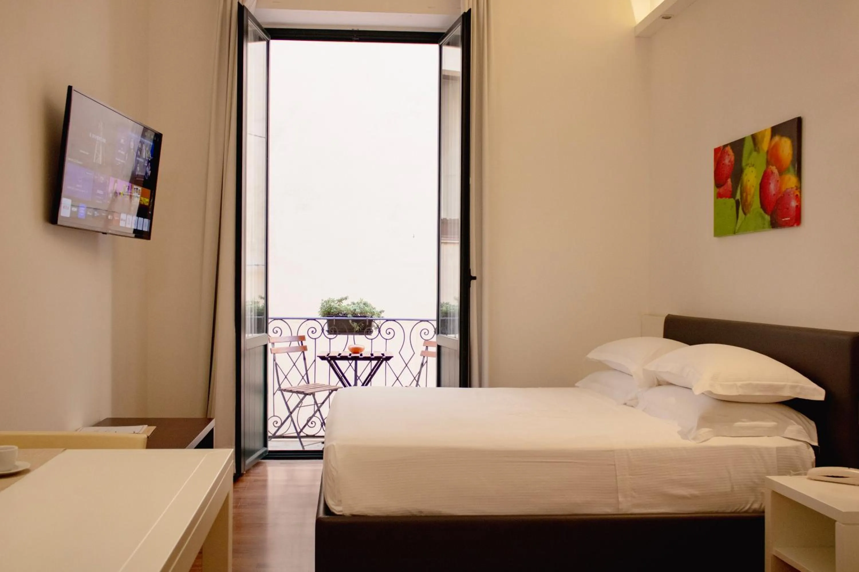 Bed in BADIA NUOVA Apart Hotel