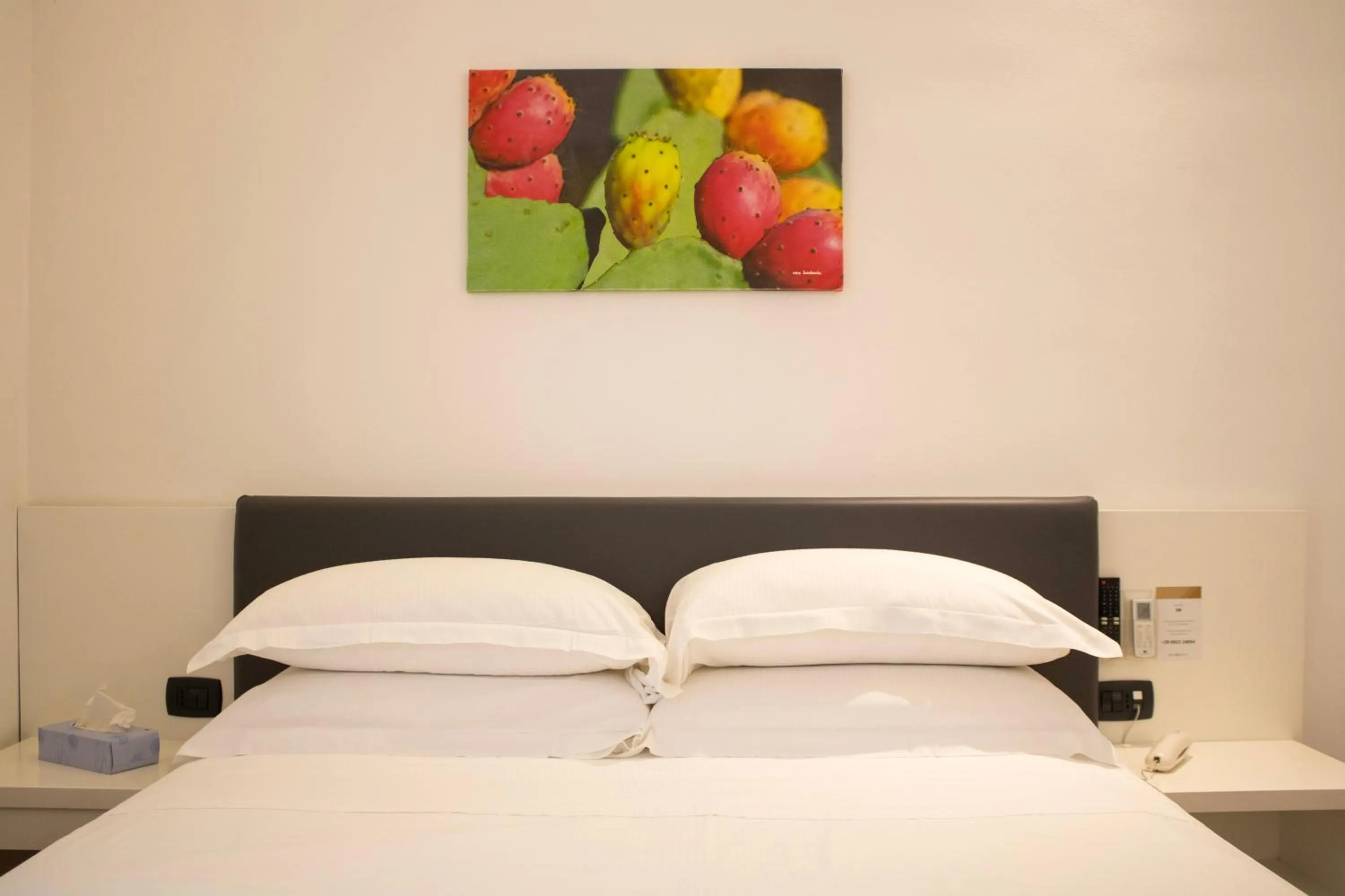 Bed in BADIA NUOVA Apart Hotel