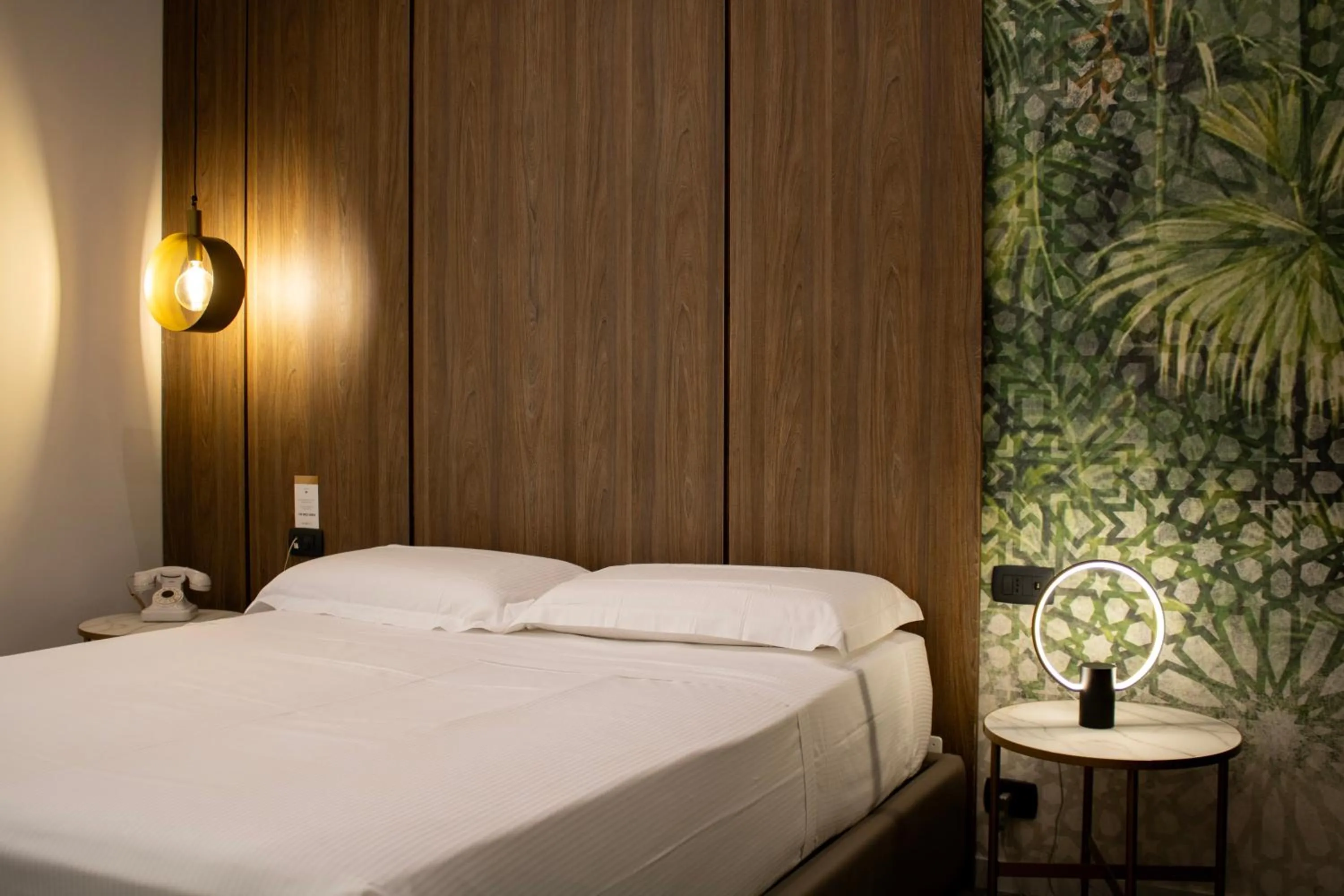 Bed in BADIA NUOVA Apart Hotel