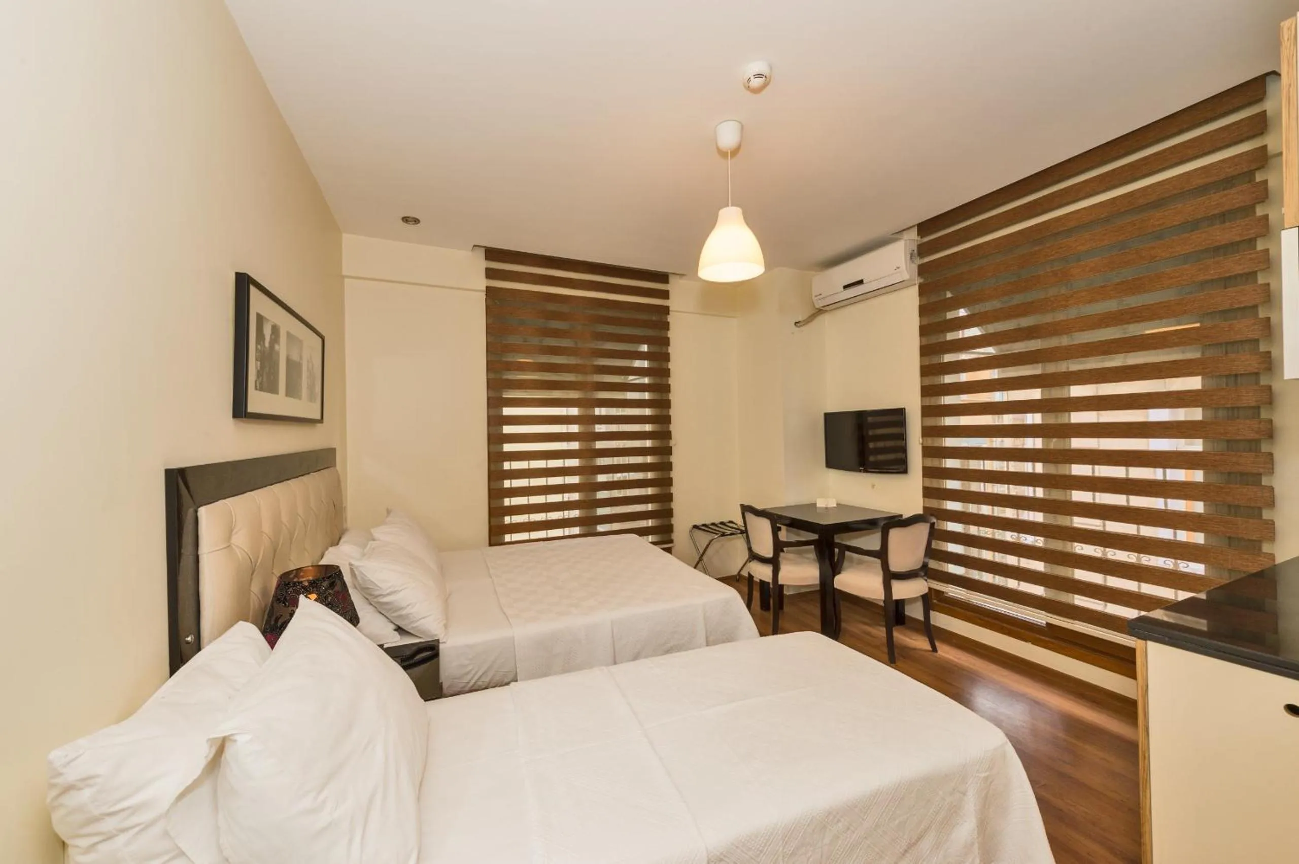 Bed in Invictum Residence