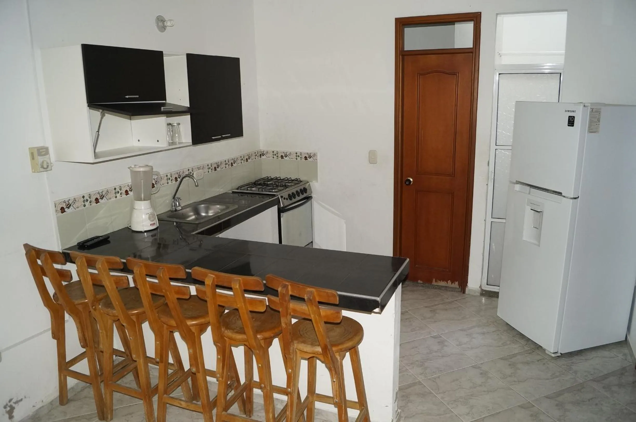 Kitchen or kitchenette in Apartahotel Tukasa Rodadero