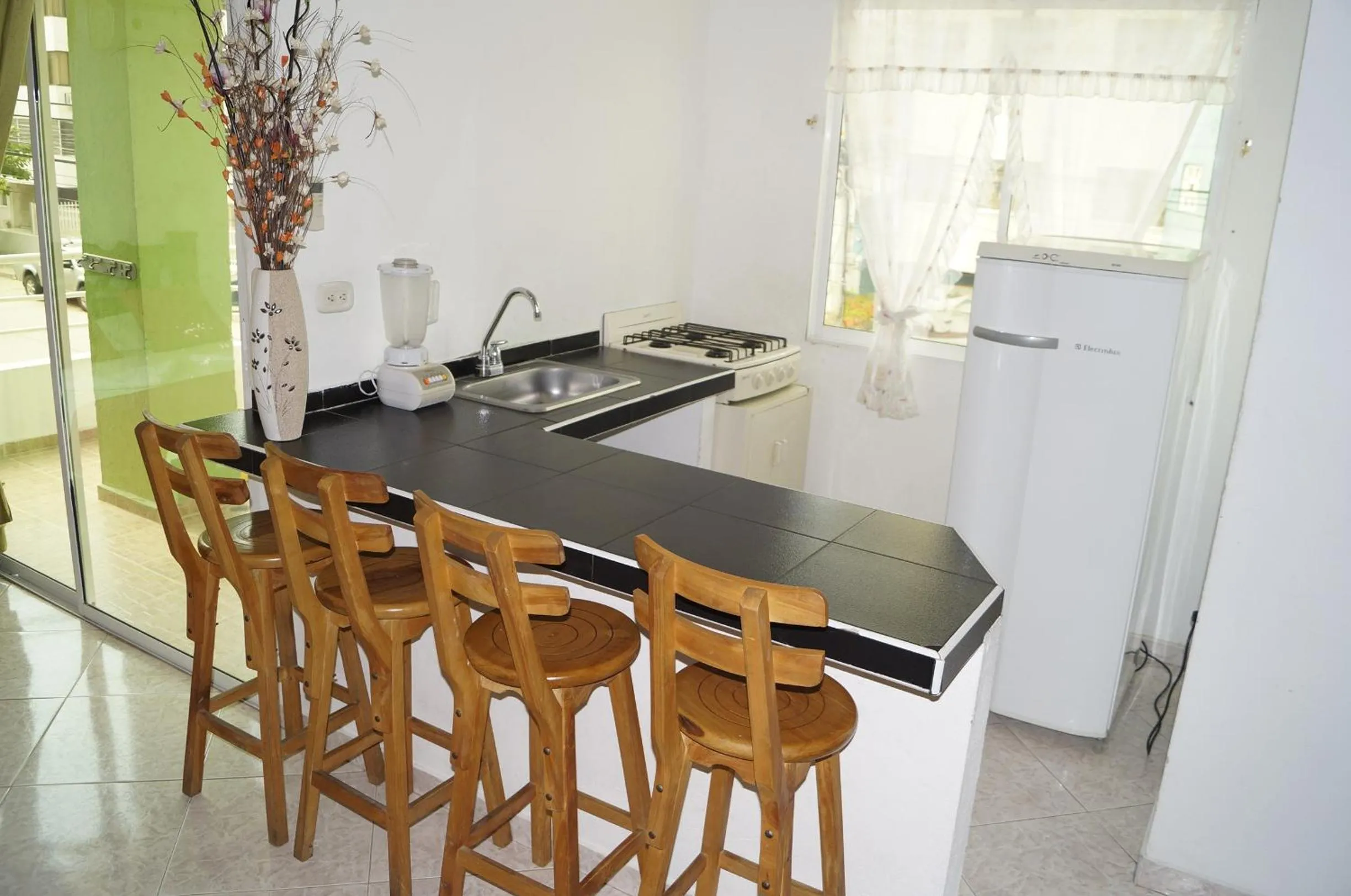 Kitchen or kitchenette in Apartahotel Tukasa Rodadero