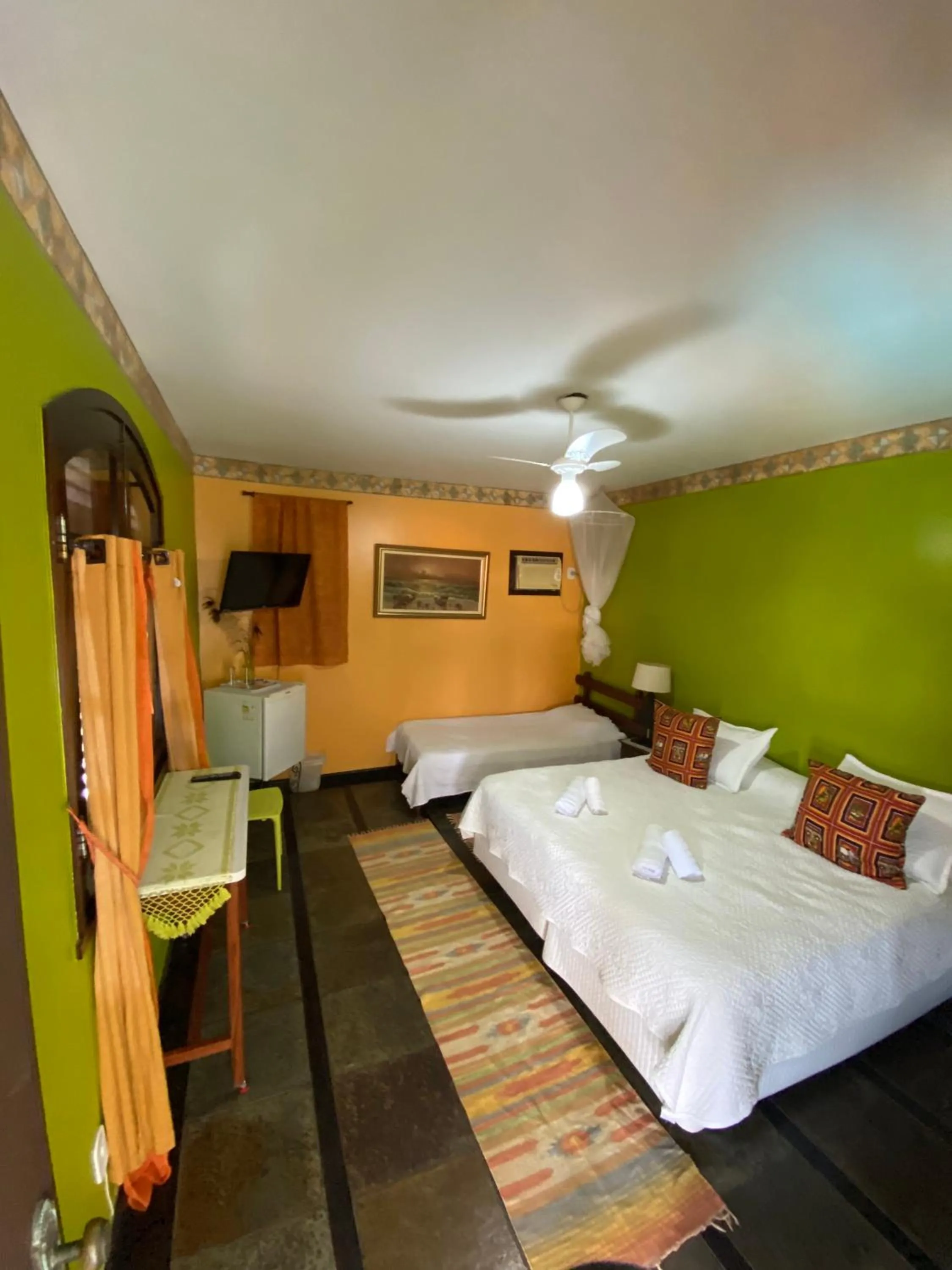 Bed in Pousada Chez Moi