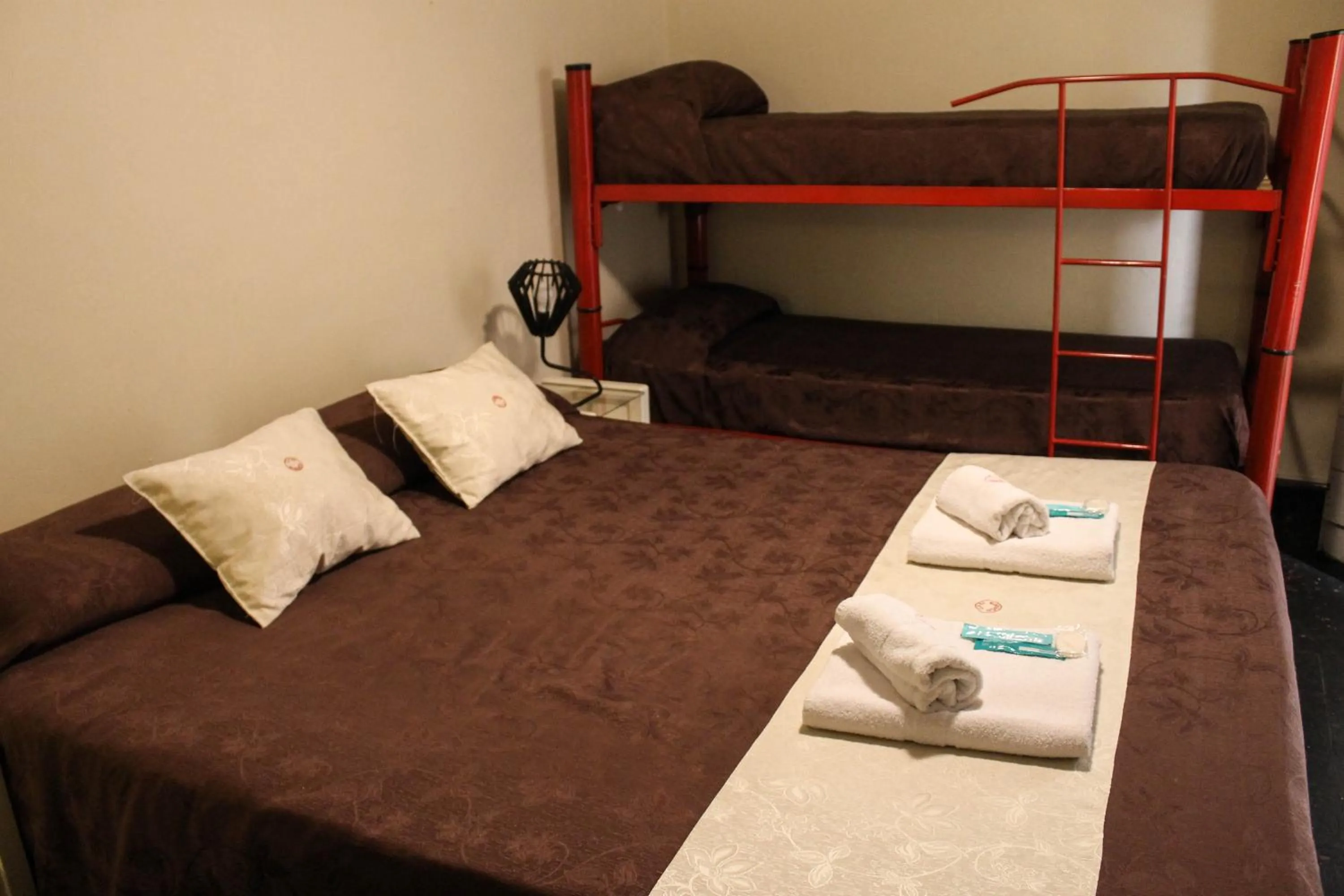 Bed in Casi Guemes Hotel