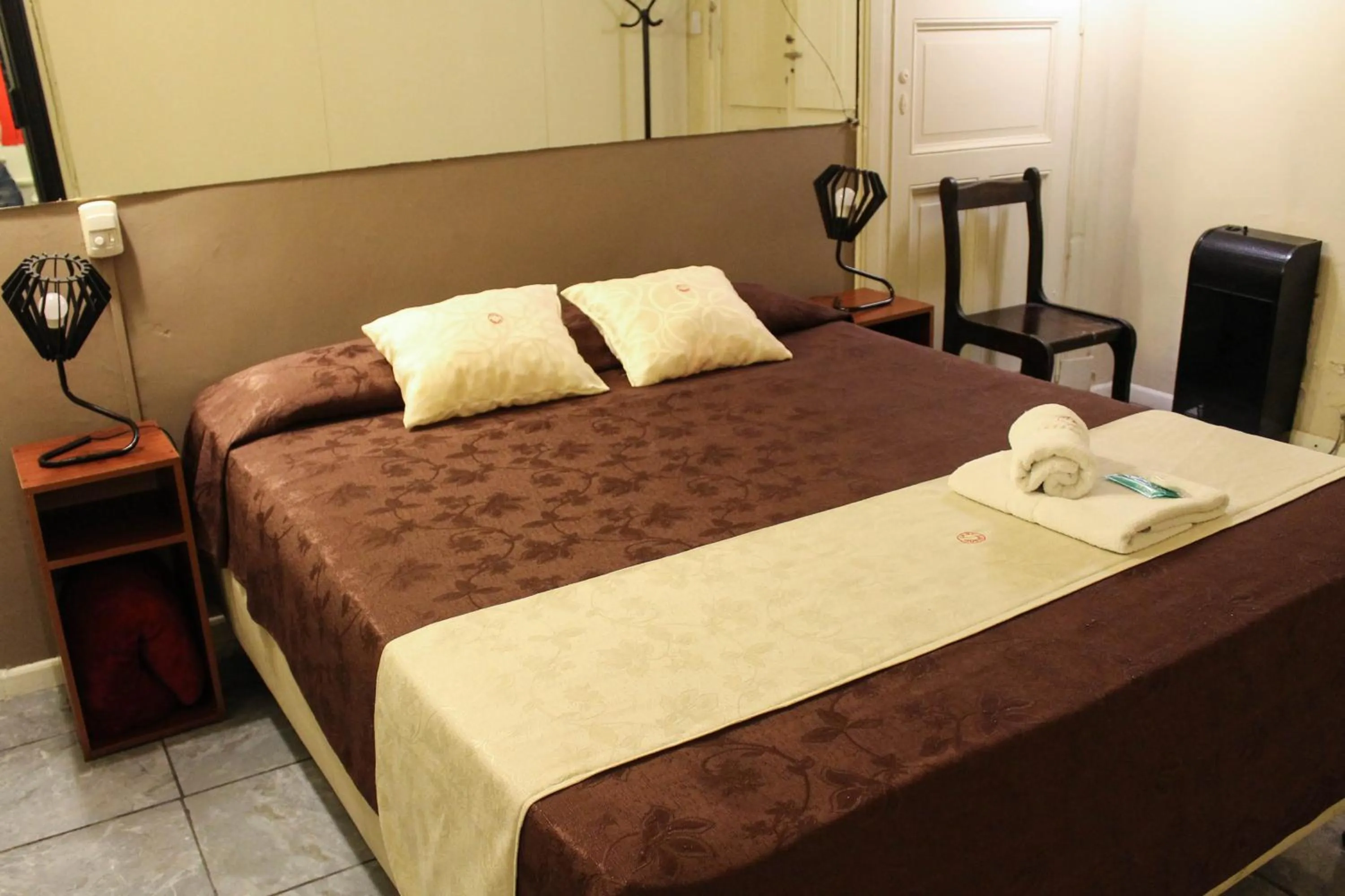 Bed in Casi Guemes Hotel