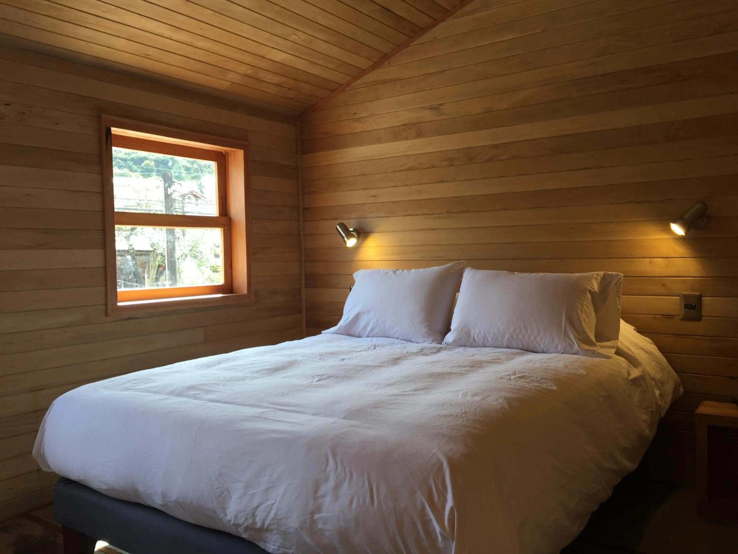 Bed in Palafito Azul Apart Hotel