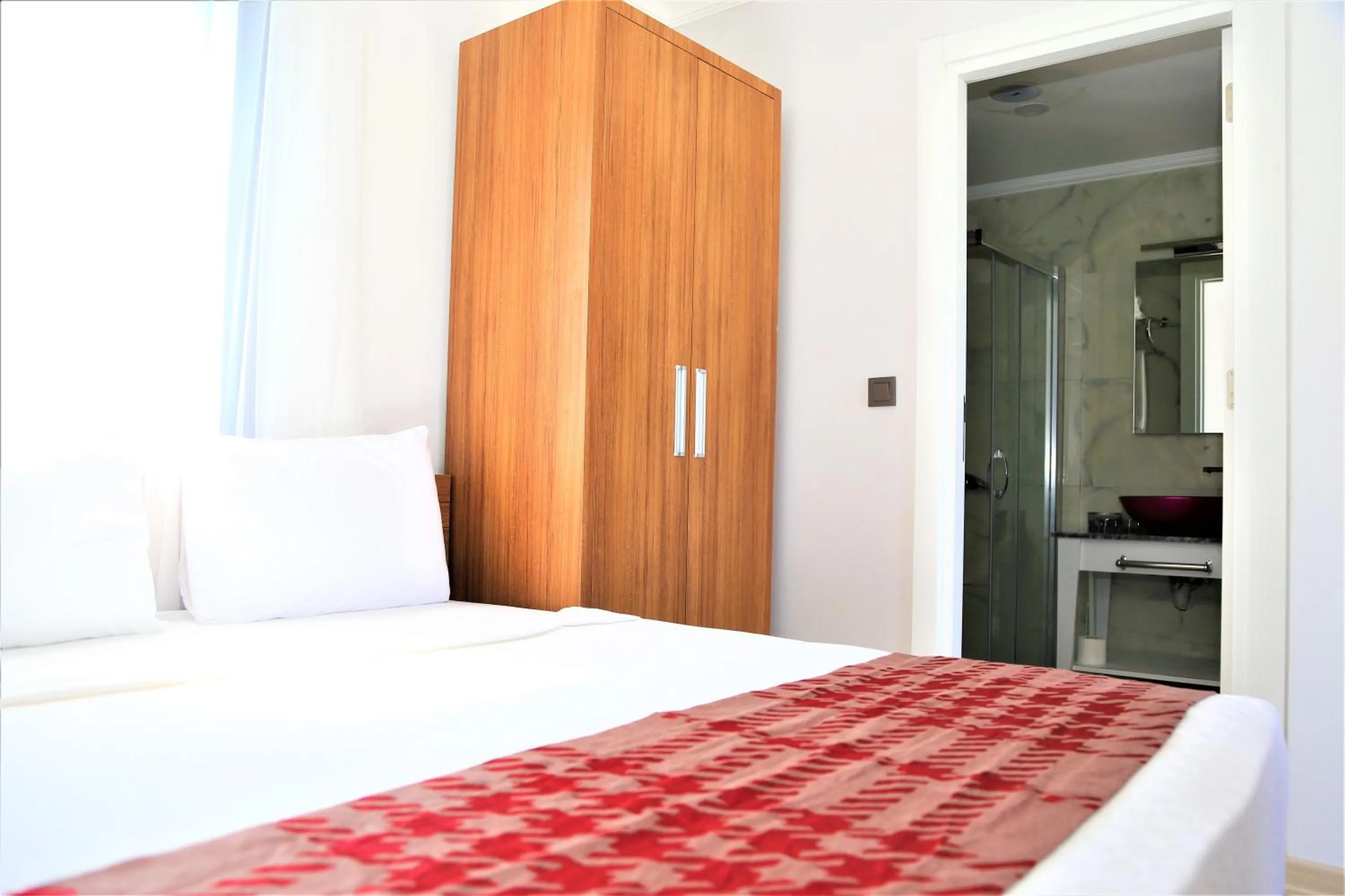 Bed in Modern Life Hotel Bodrum