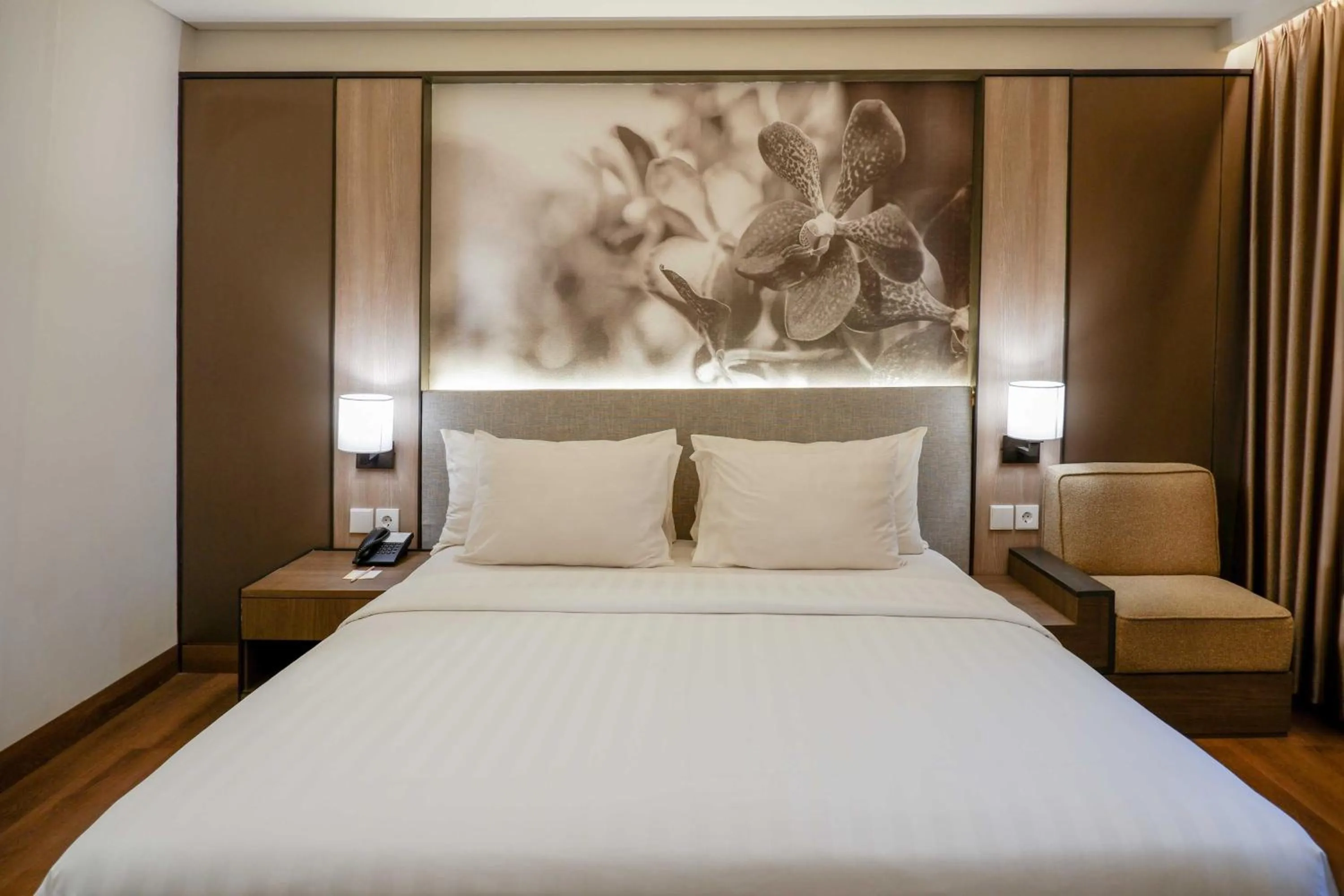 Bed in Orchardz Jayakarta