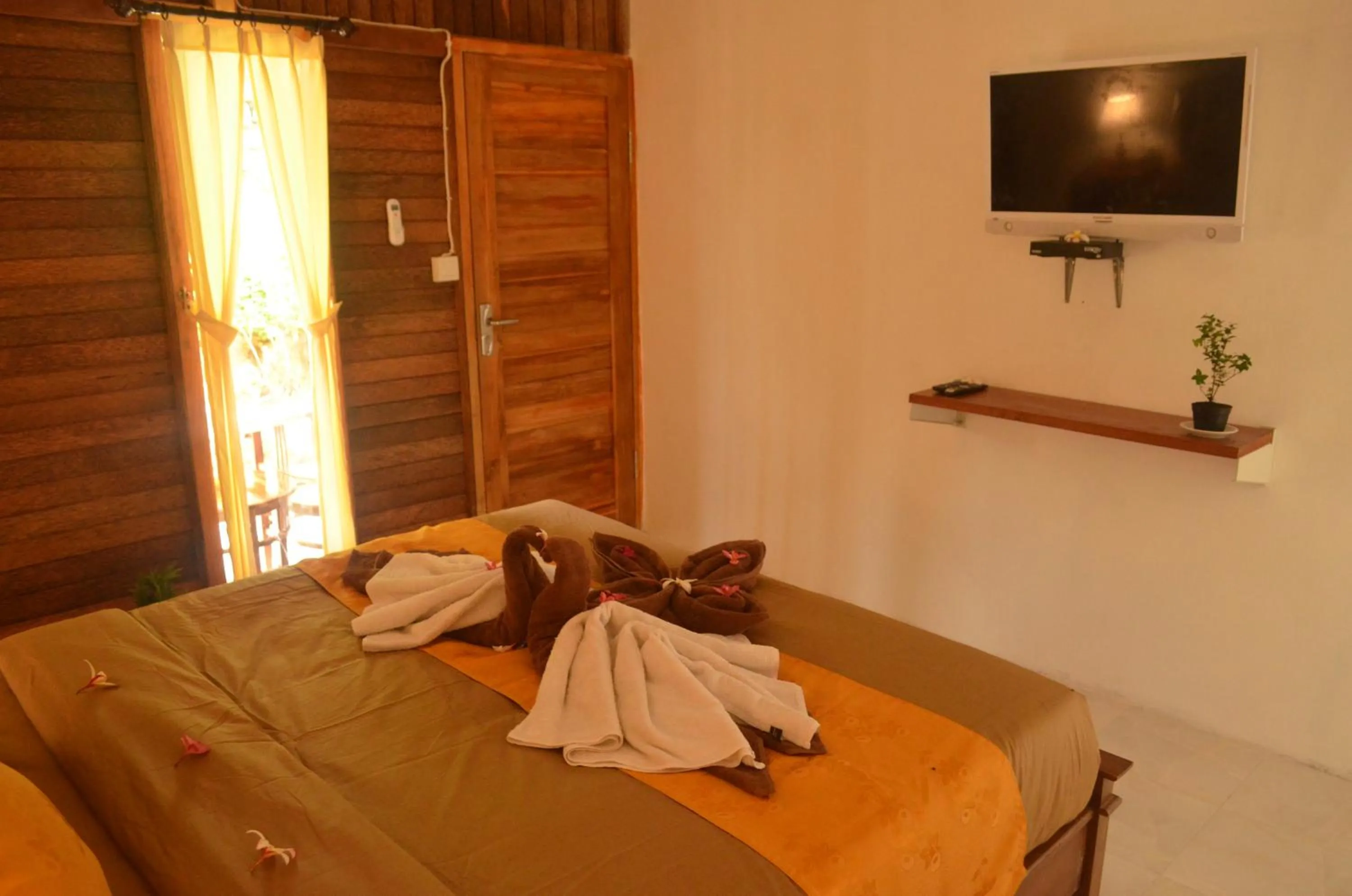 Communal lounge/ TV room in The Rahayu Cottage