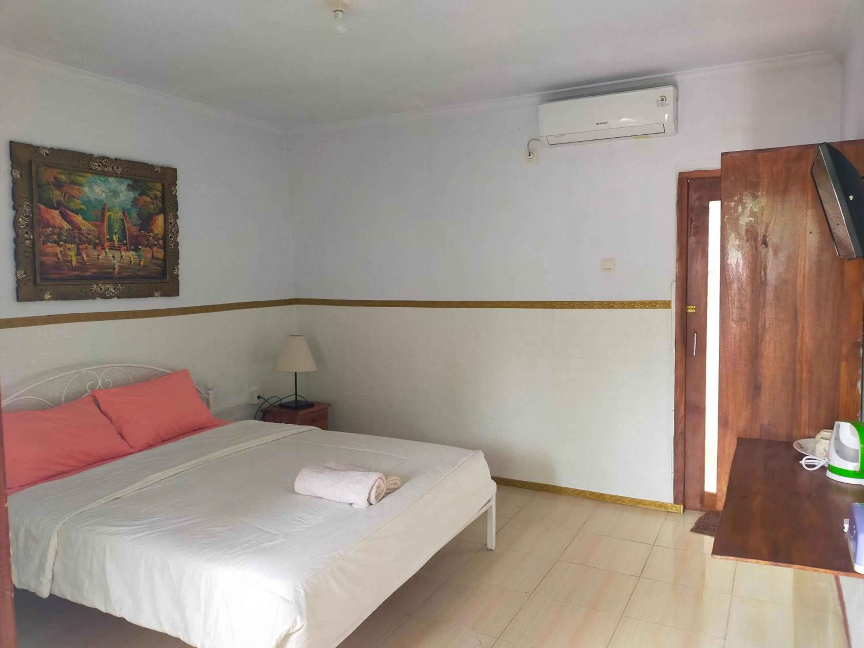 Bed in The Rahayu Cottage