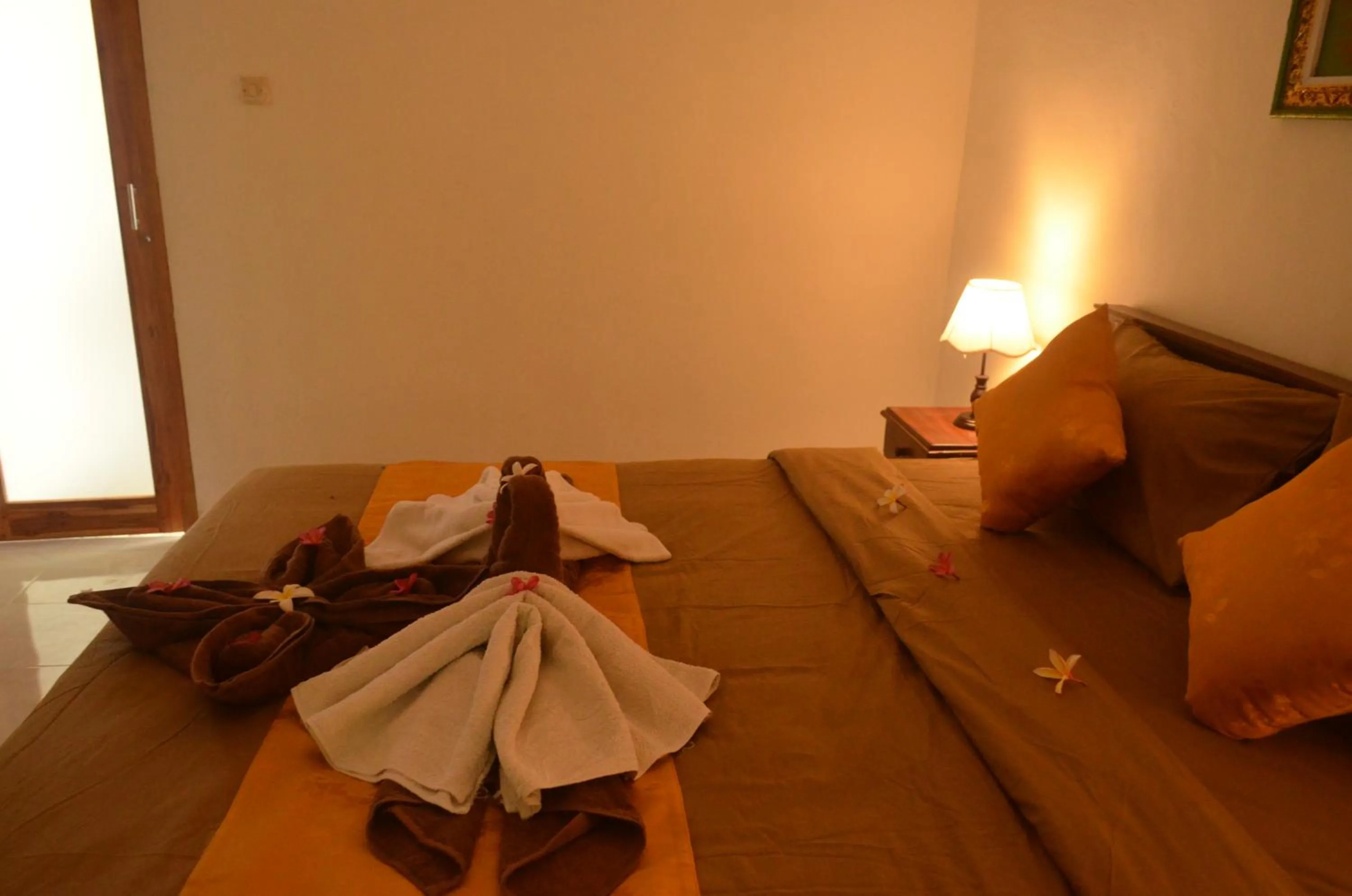 Bed in The Rahayu Cottage