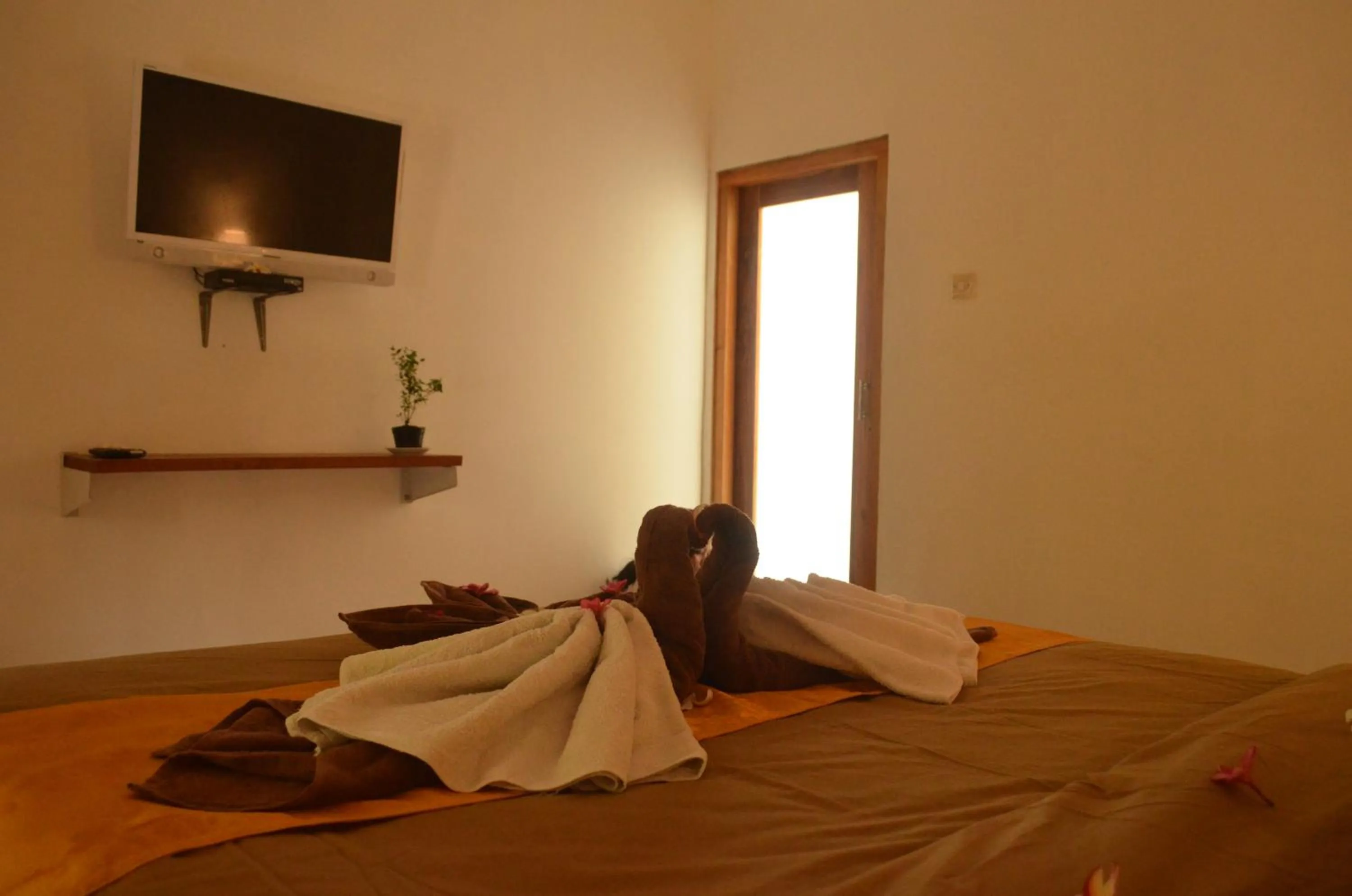 Communal lounge/ TV room in The Rahayu Cottage