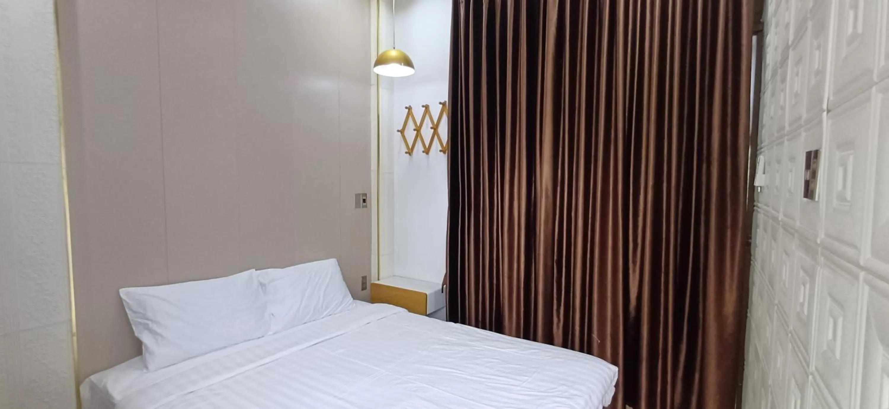 Bed in Seashine Apartment