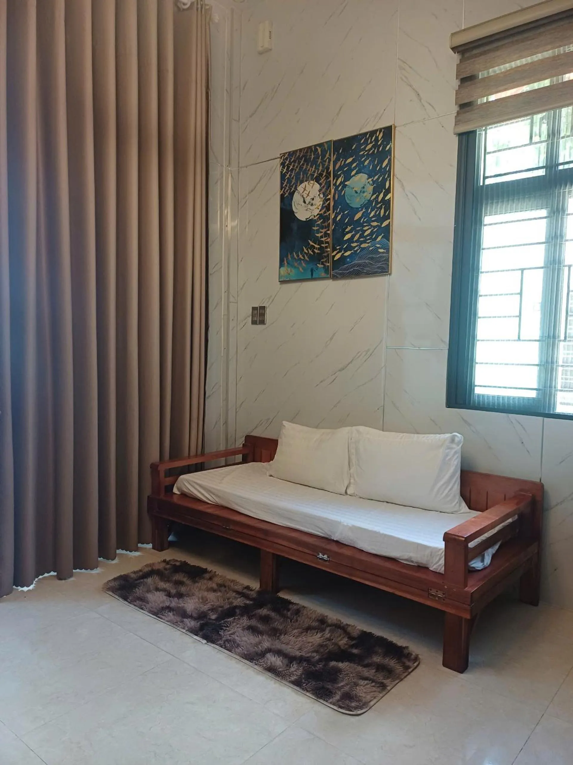 Living room, Bed in Seashine Apartment