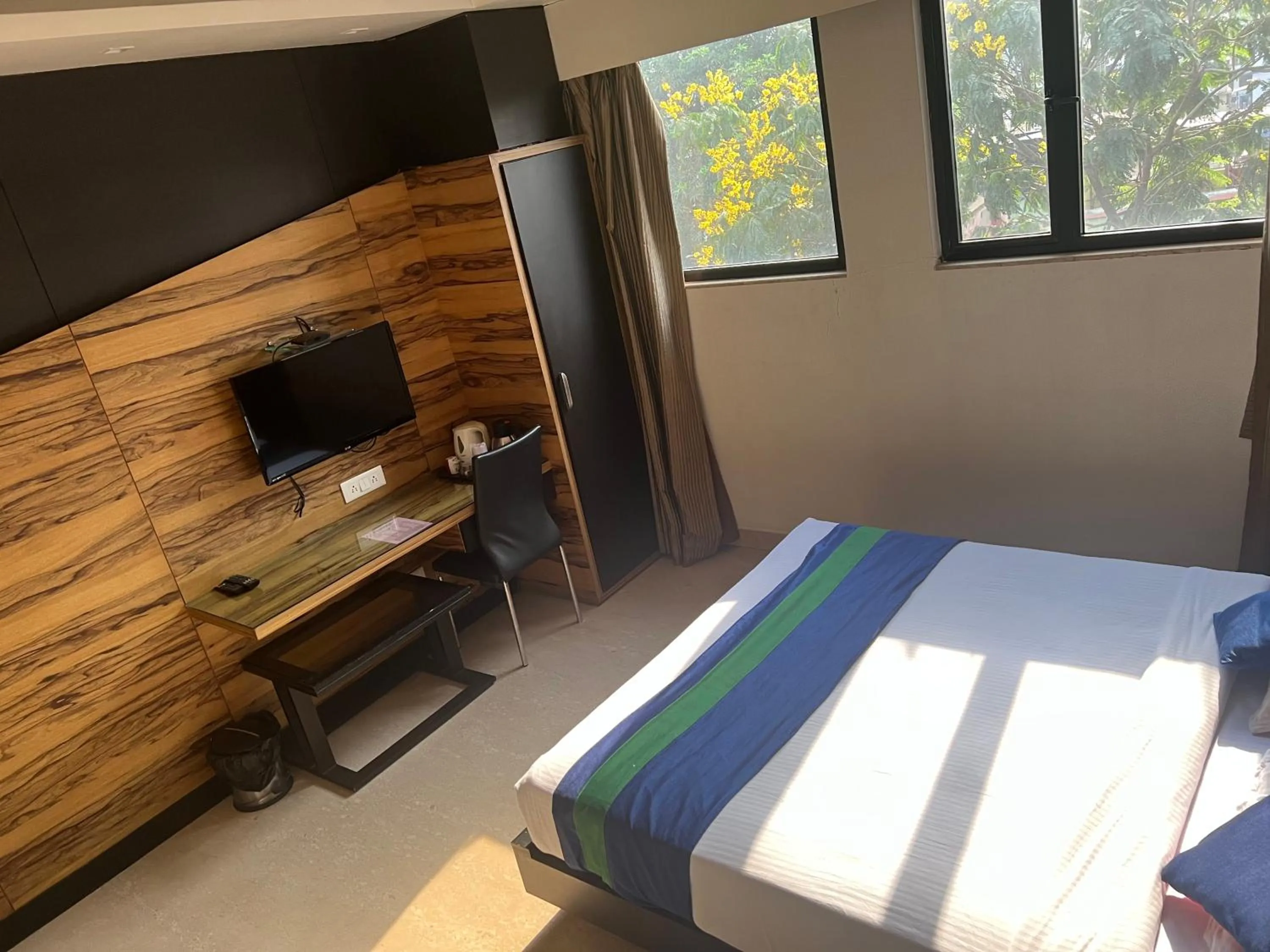 Bed in Hotel Aston International