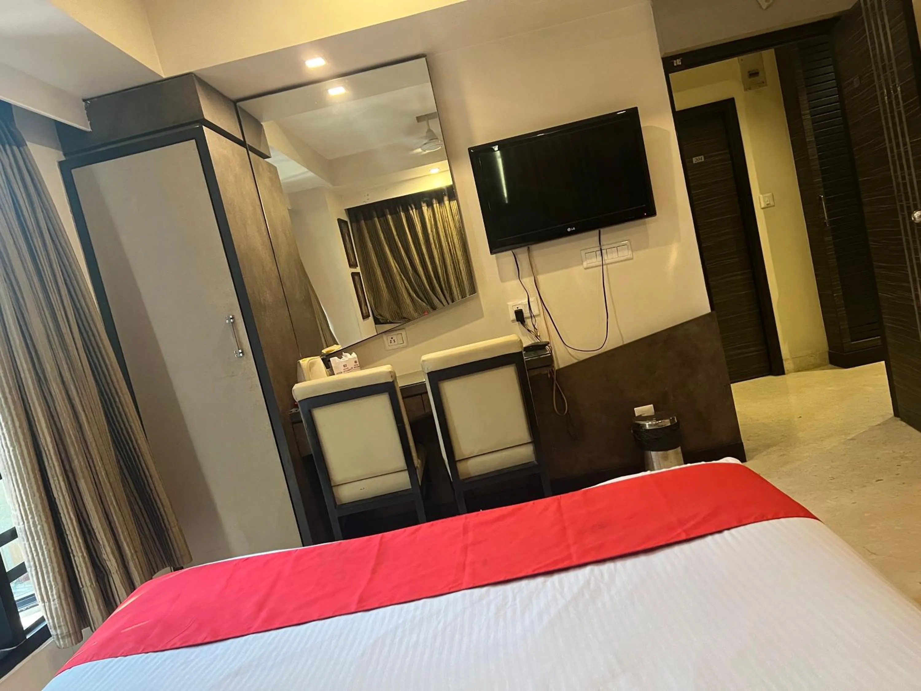 Bed in Hotel Aston International