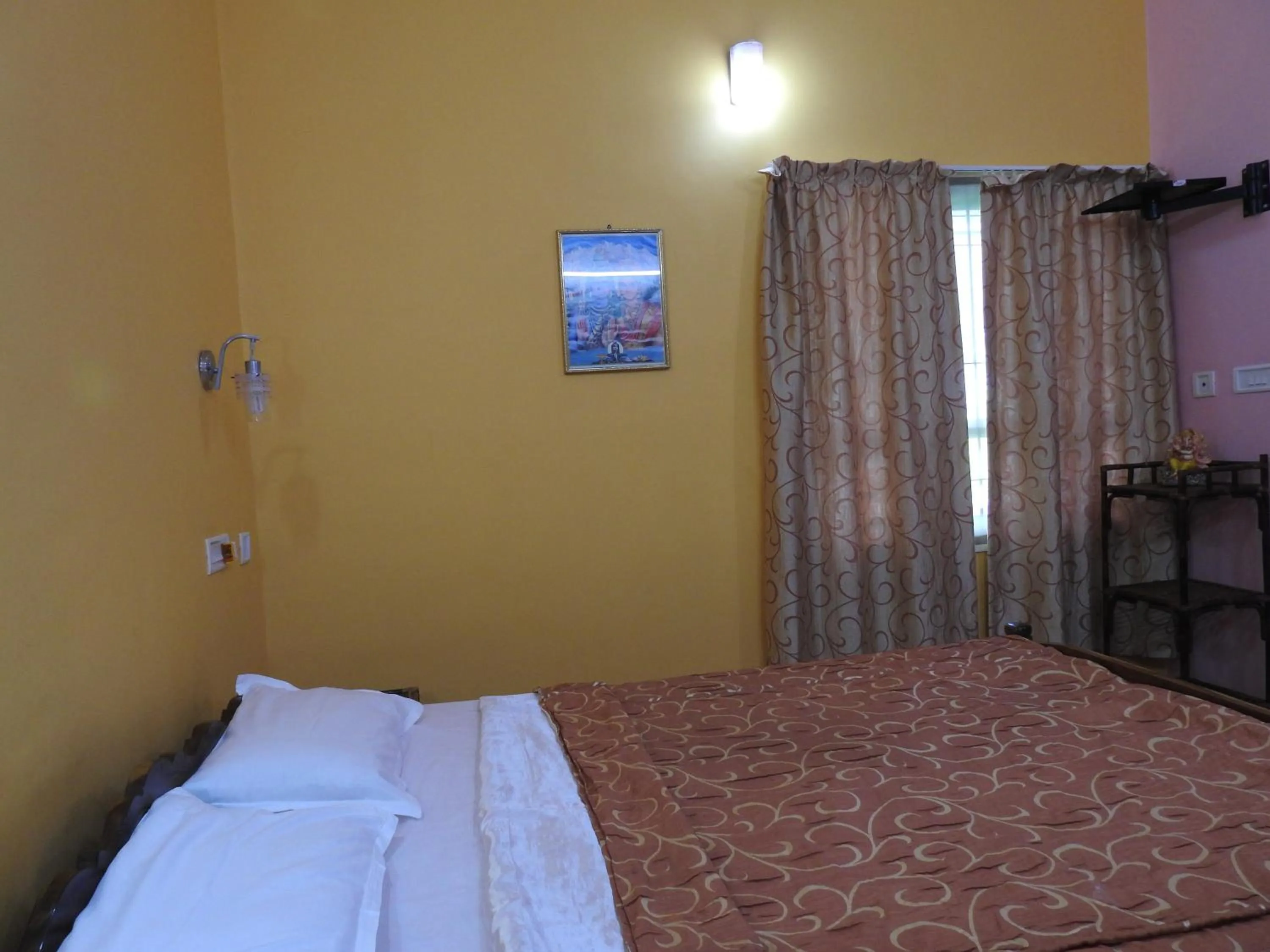 Bed in Kadalamma Beach Homestay