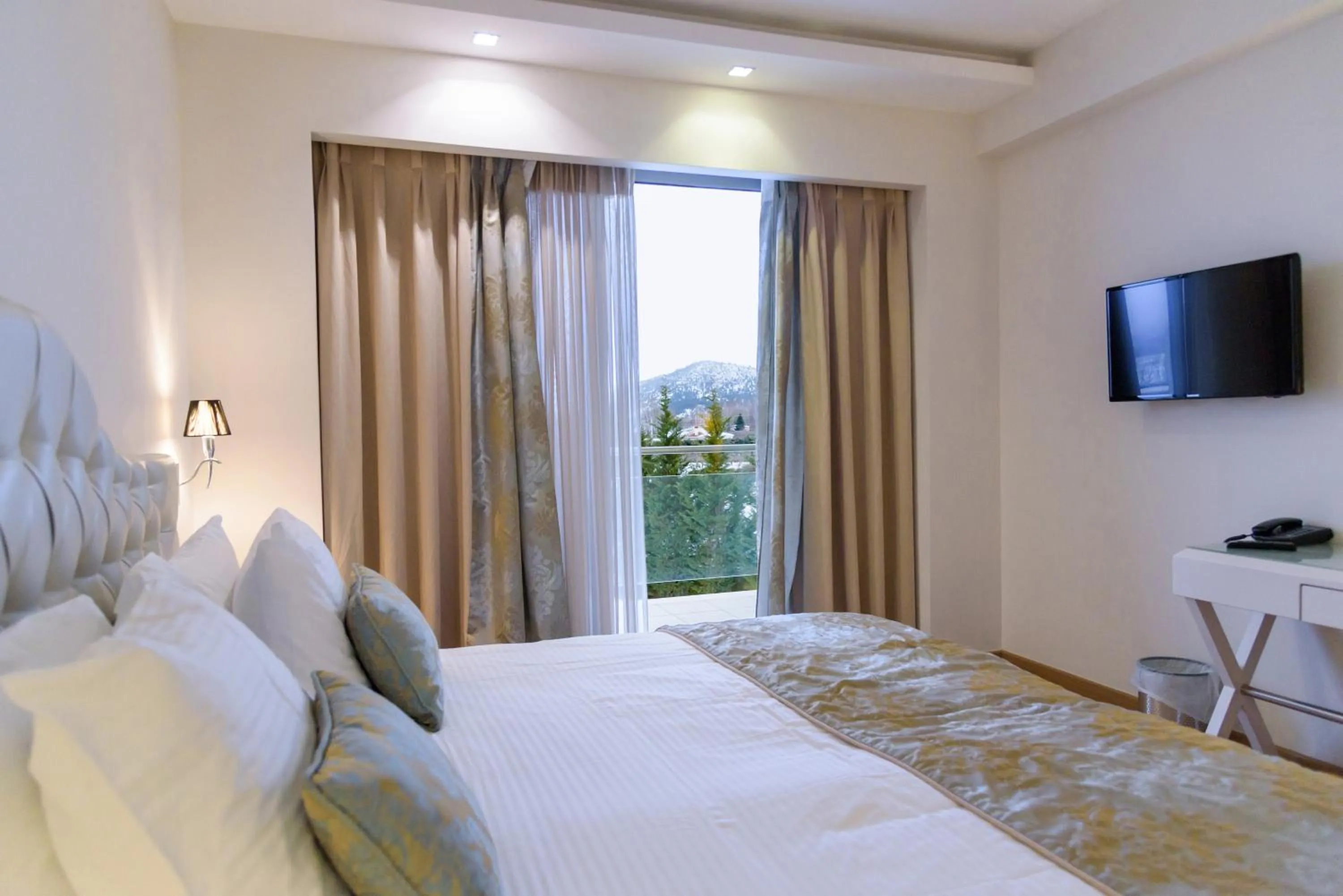 Bed in Calma Hotel & Spa