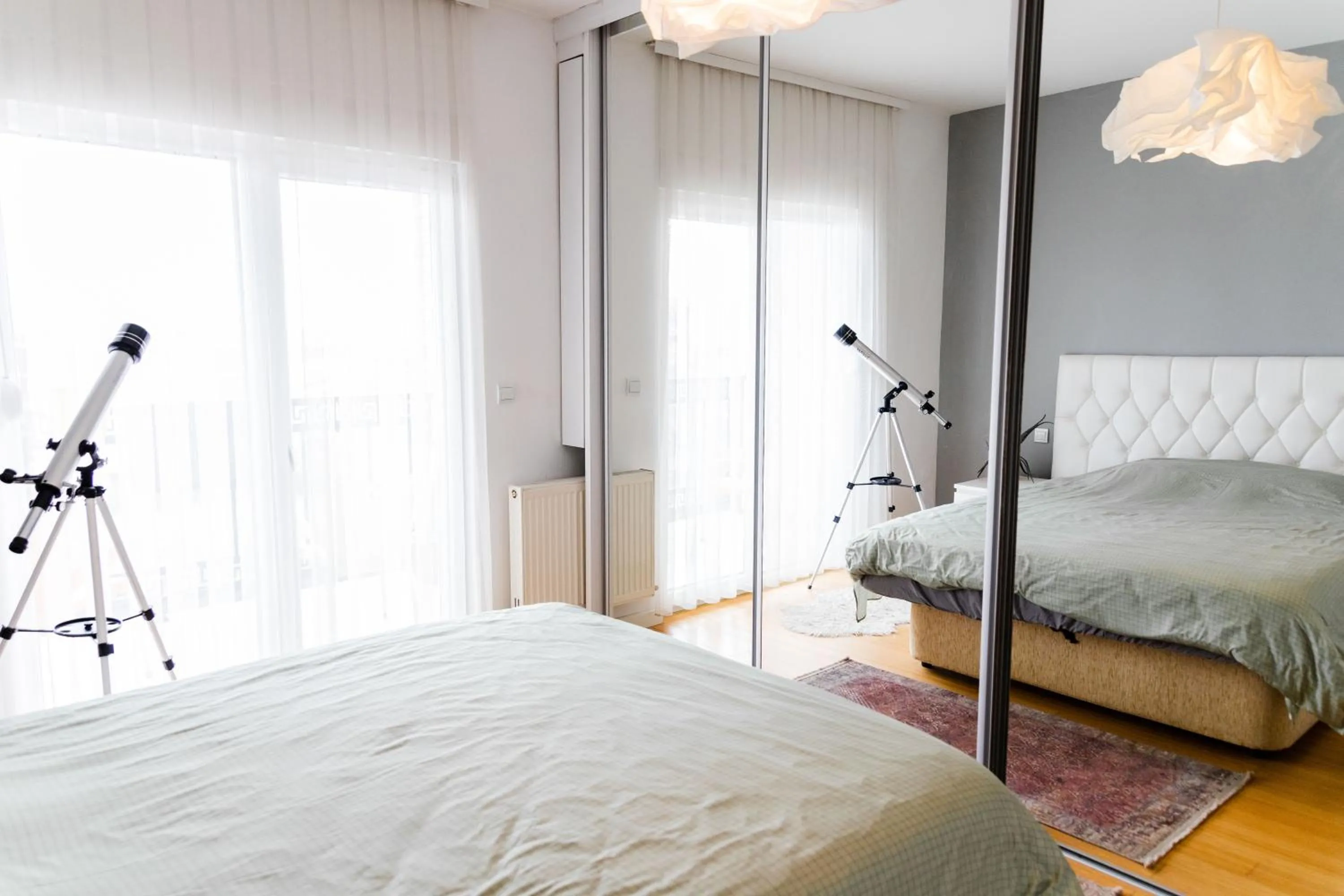 Bed in Modern apartment with a view feels like home