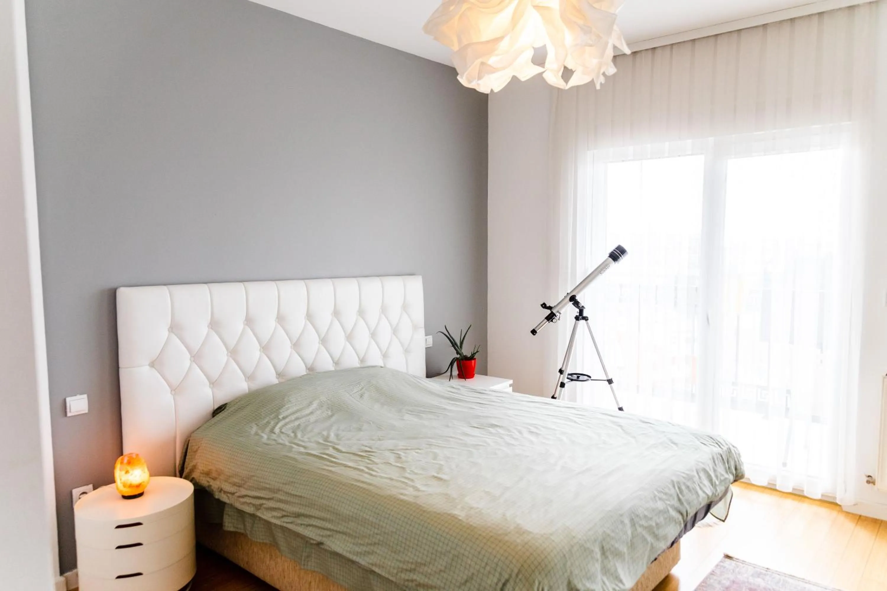 Bed in Modern apartment with a view feels like home