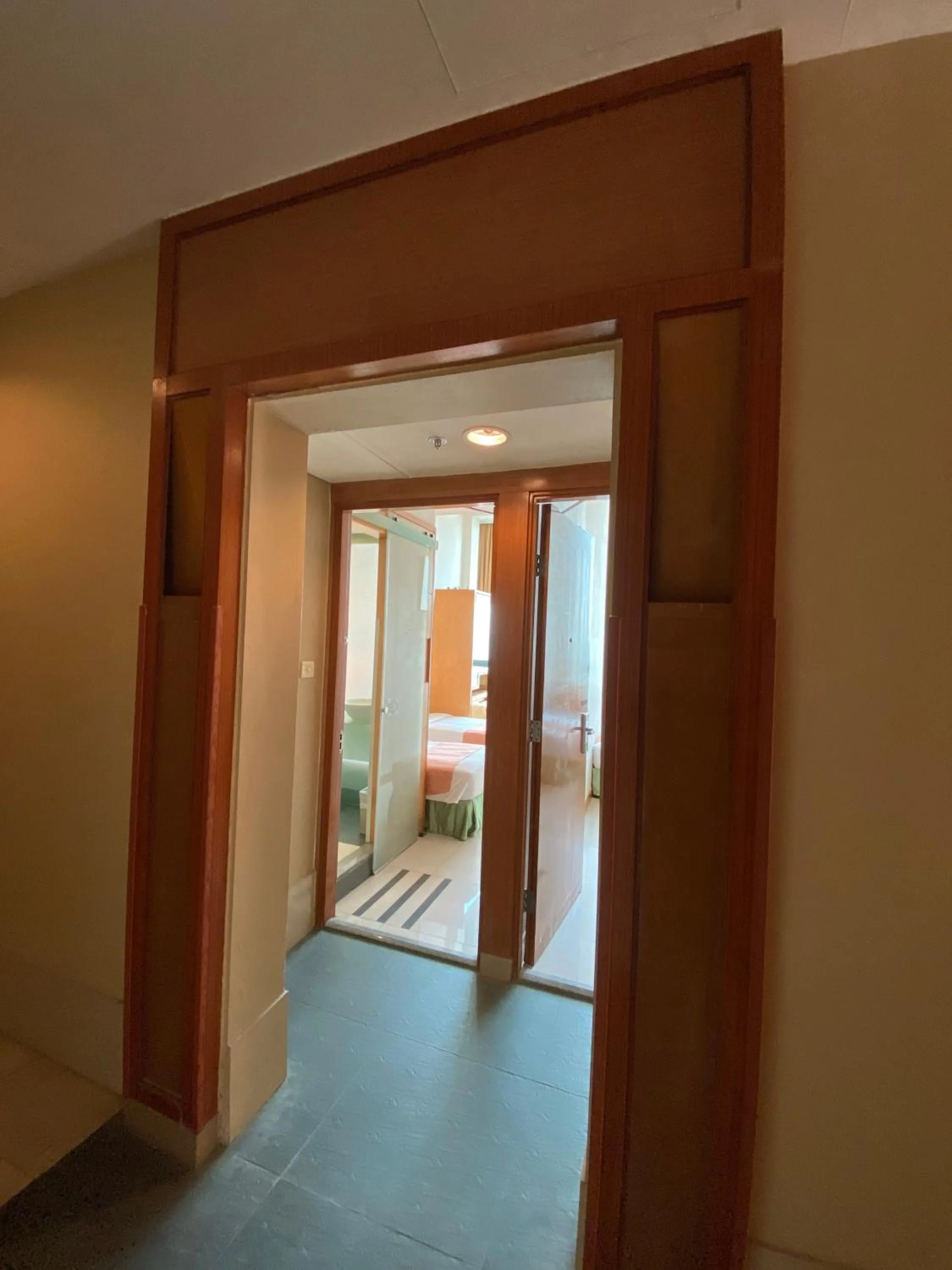 Bedroom in Rambler Garden Hotel