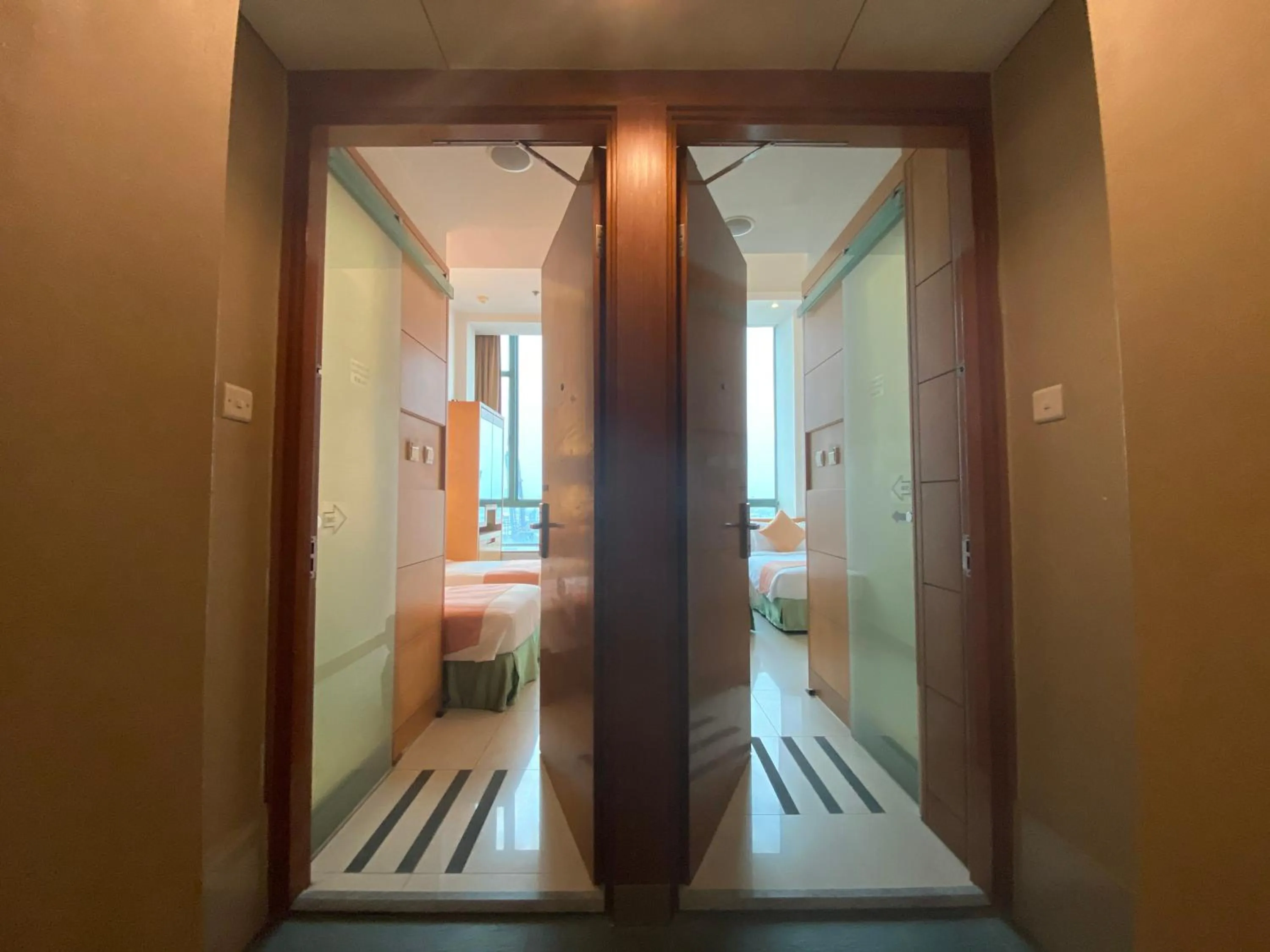 Bedroom in Rambler Garden Hotel