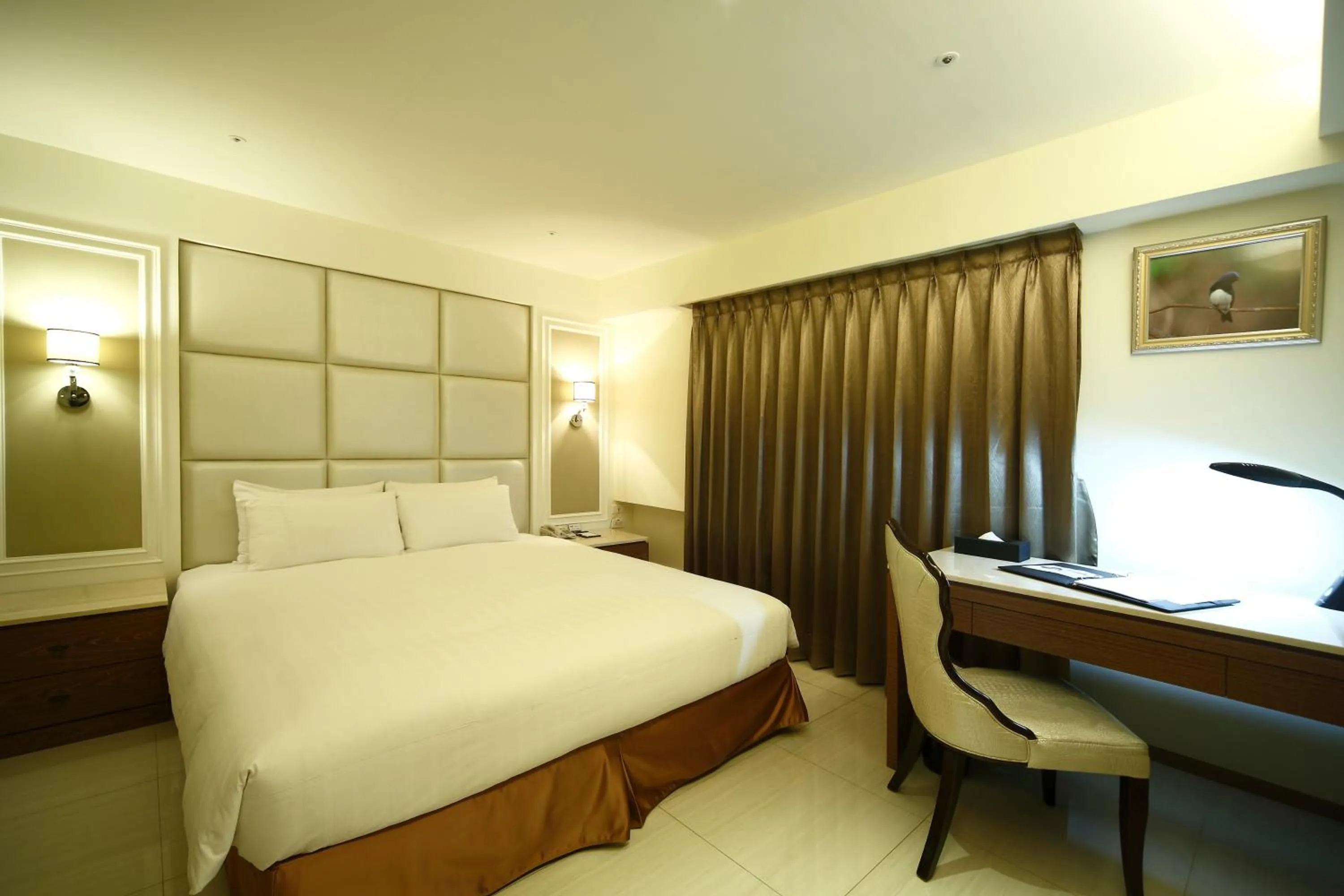 Bed in Nest Hotel