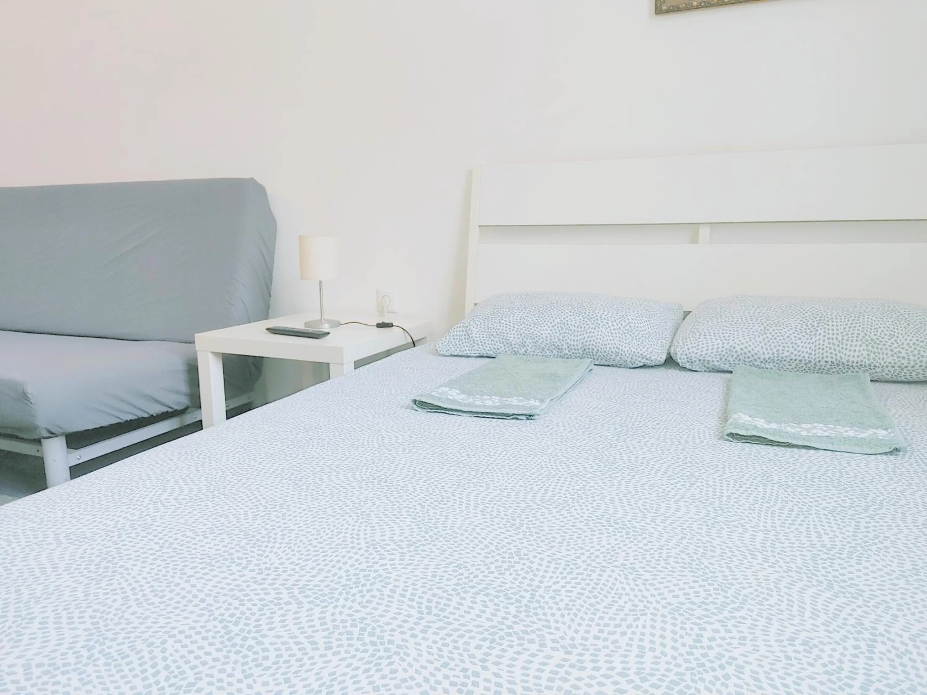 Bed in Sleepover City Center GuestRooms