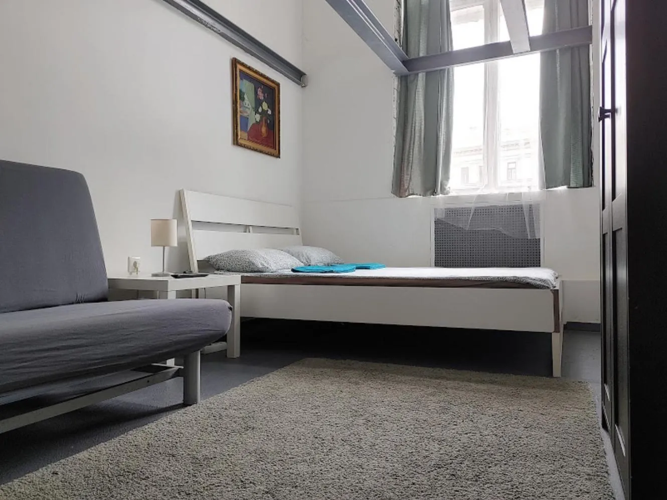 Bed in Sleepover City Center GuestRooms
