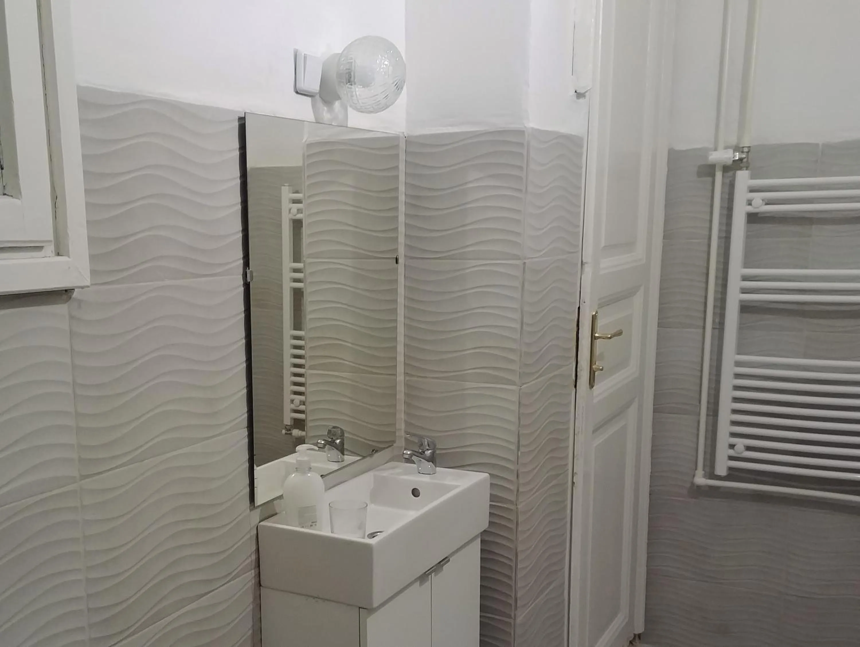 Toilet in Sleepover City Center GuestRooms