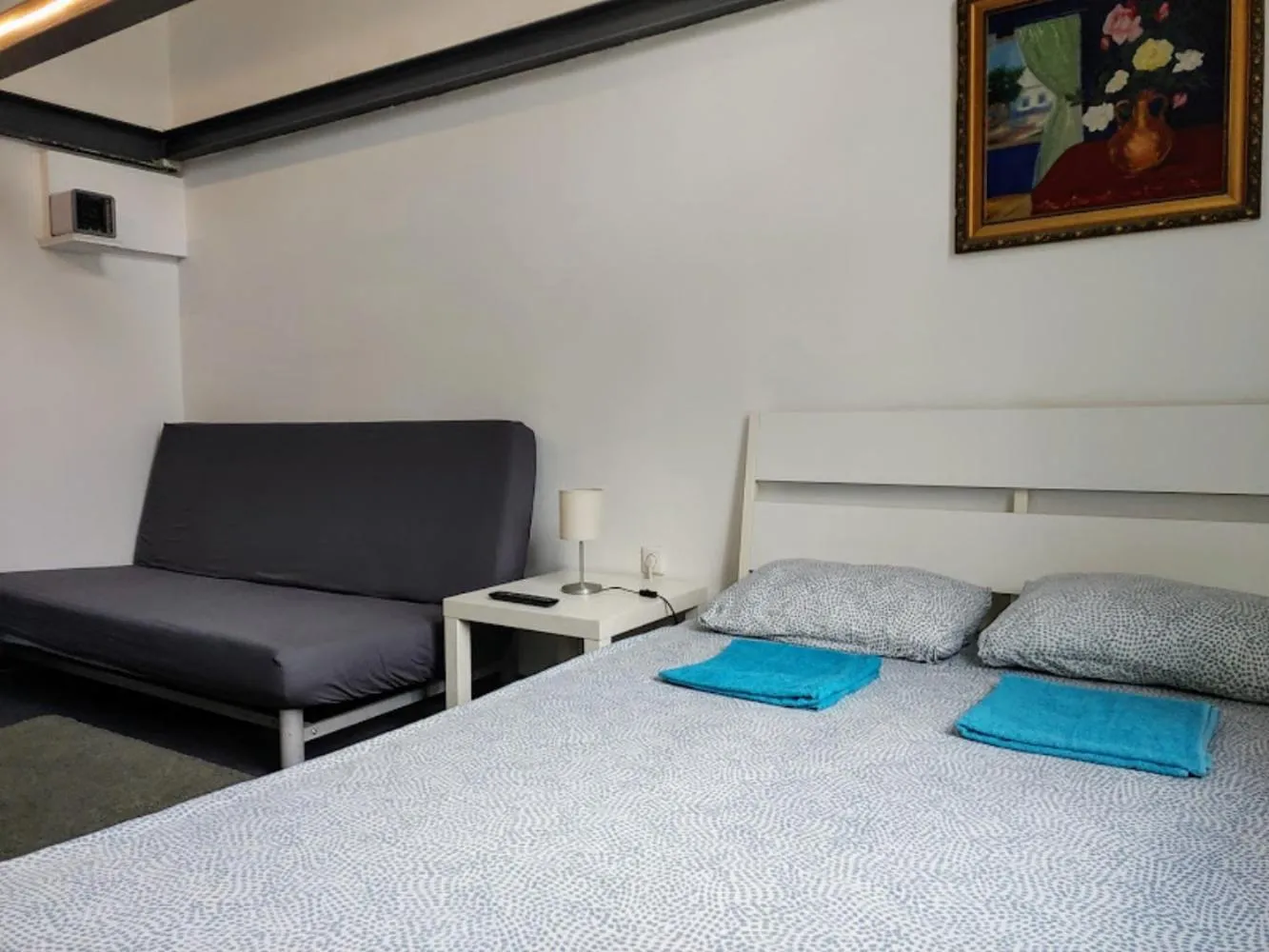 Bed in Sleepover City Center GuestRooms
