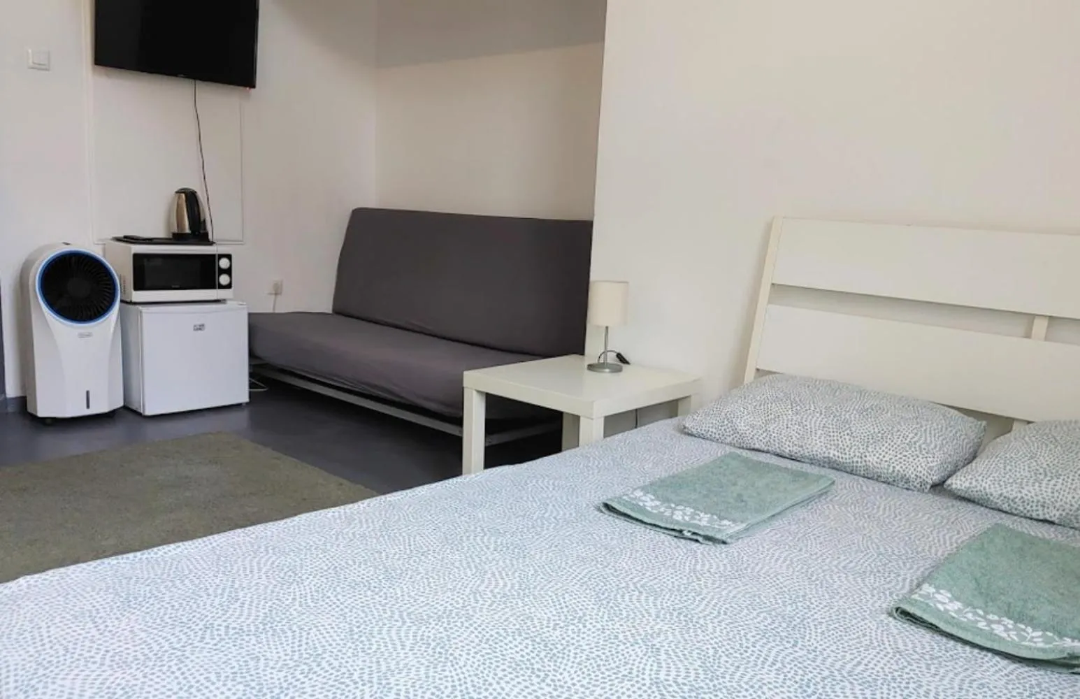 Bed in Sleepover City Center GuestRooms