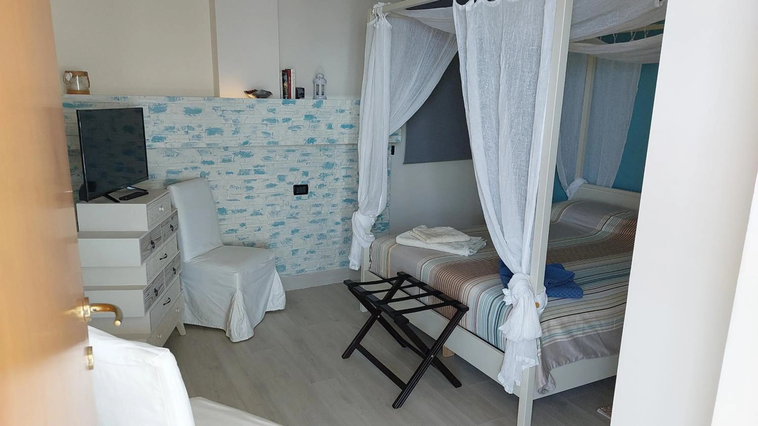 Bed in Attico Sottovento